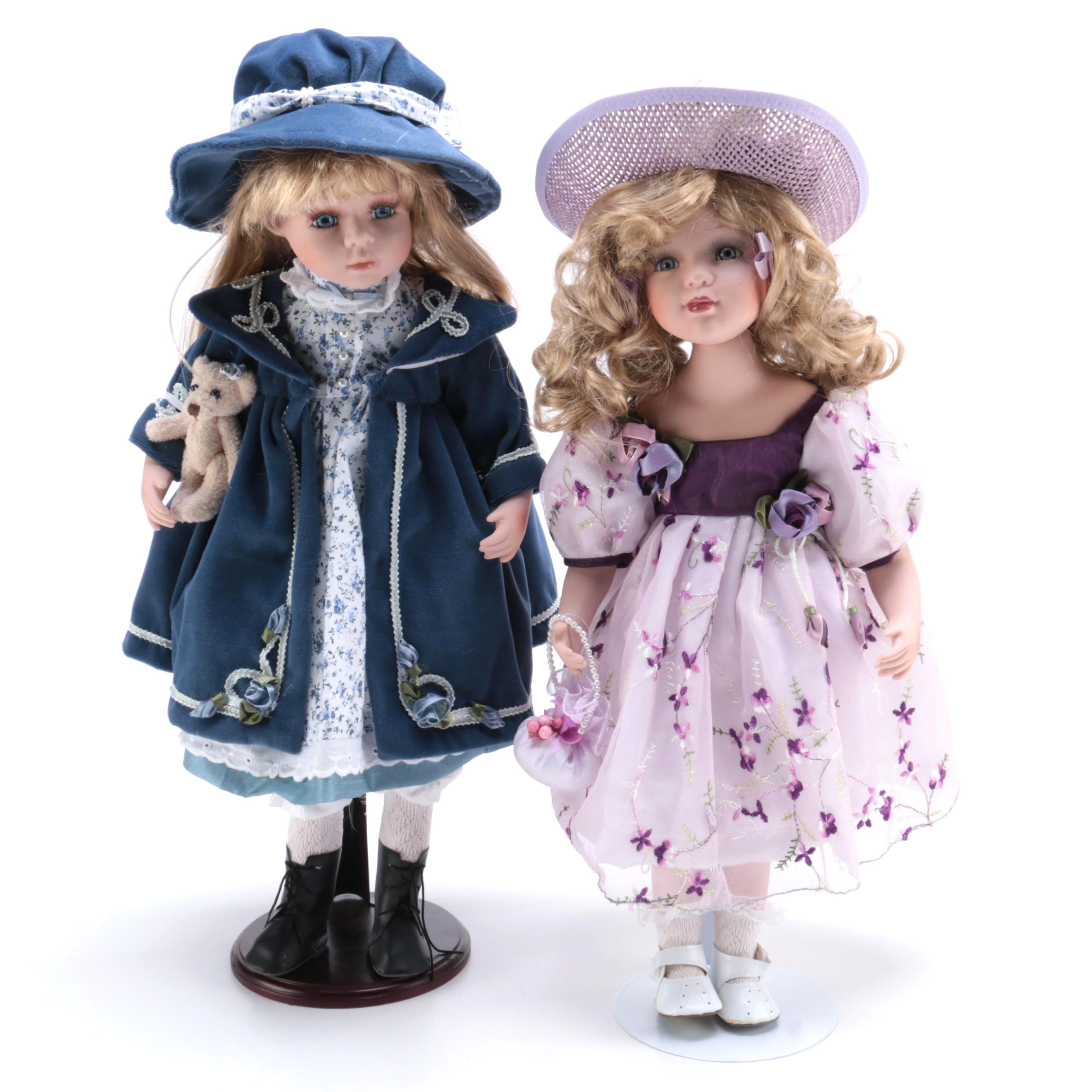A Pair of Porcelain Dolls