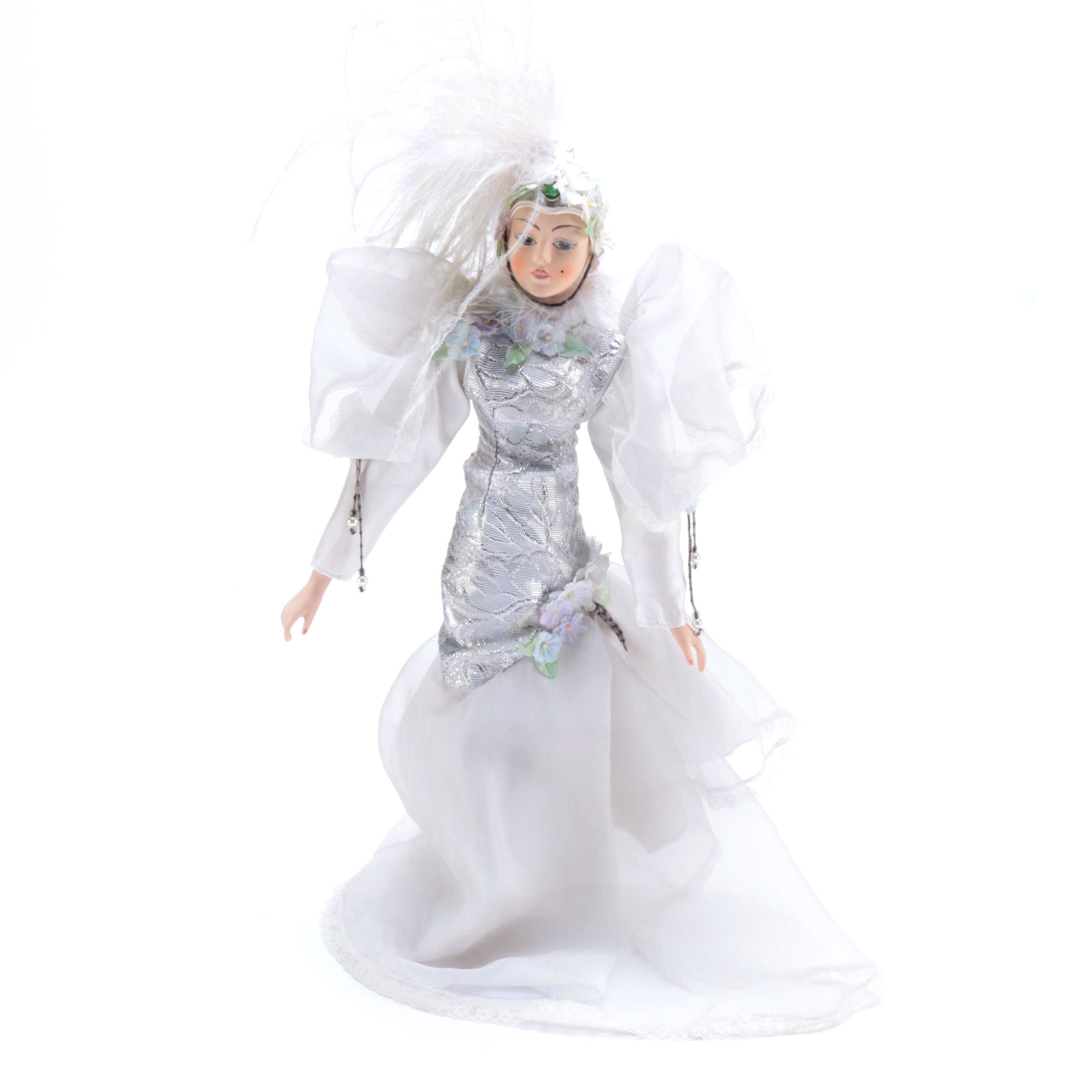 Porcelain Doll in a White Dress