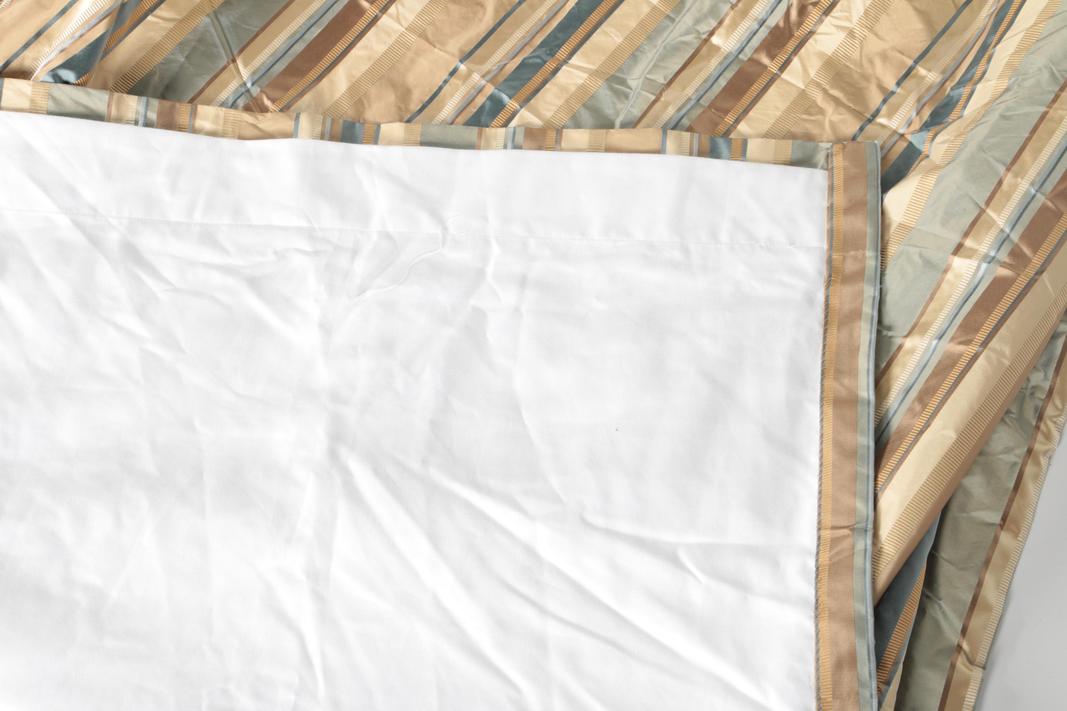 Pair of Striped Curtains and a Plaid Valance