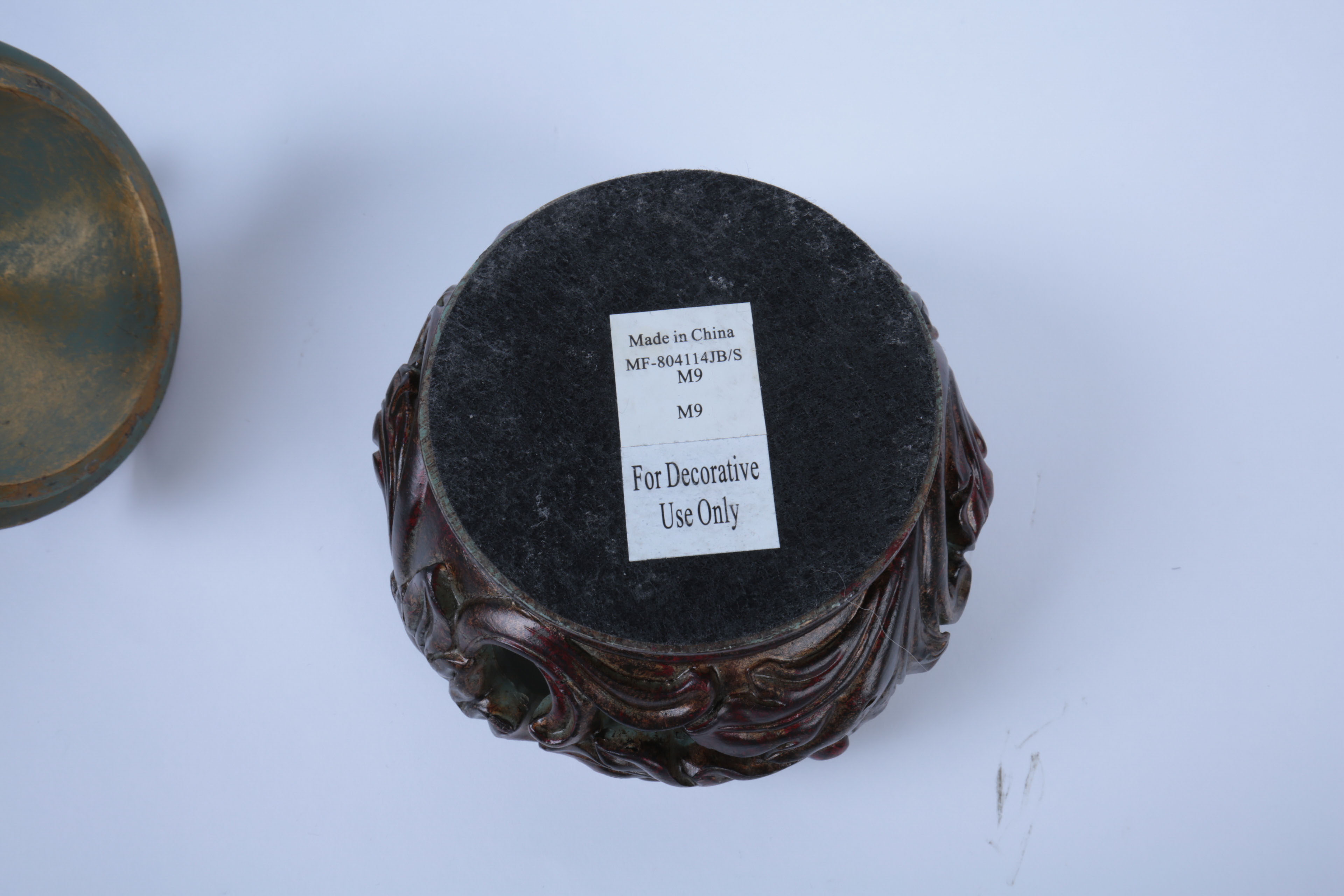 Collection of Ornate Black and Gold Tone Decor