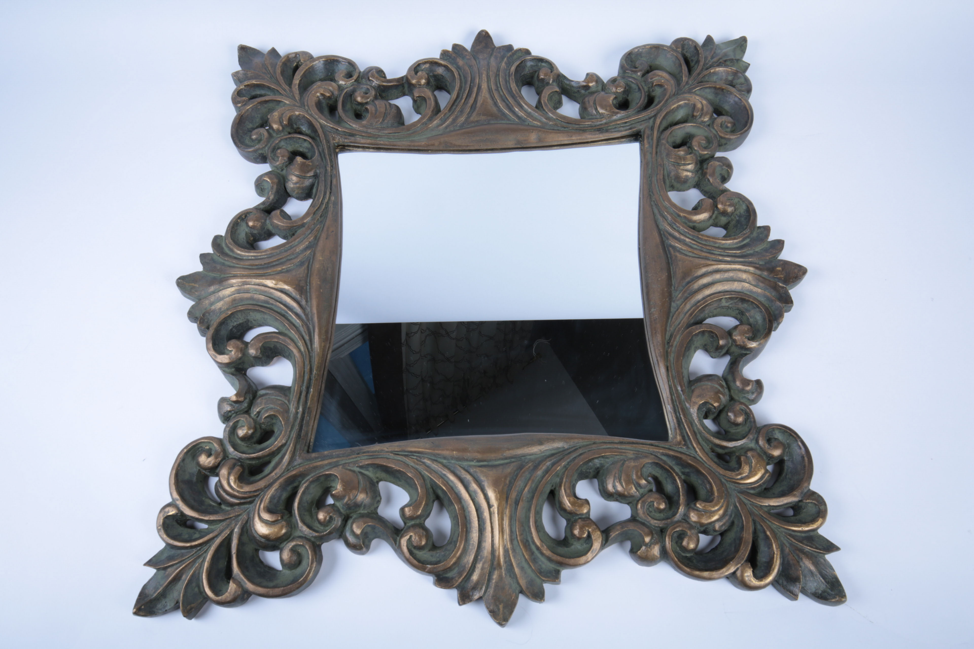 Collection of Ornate Black and Gold Tone Decor