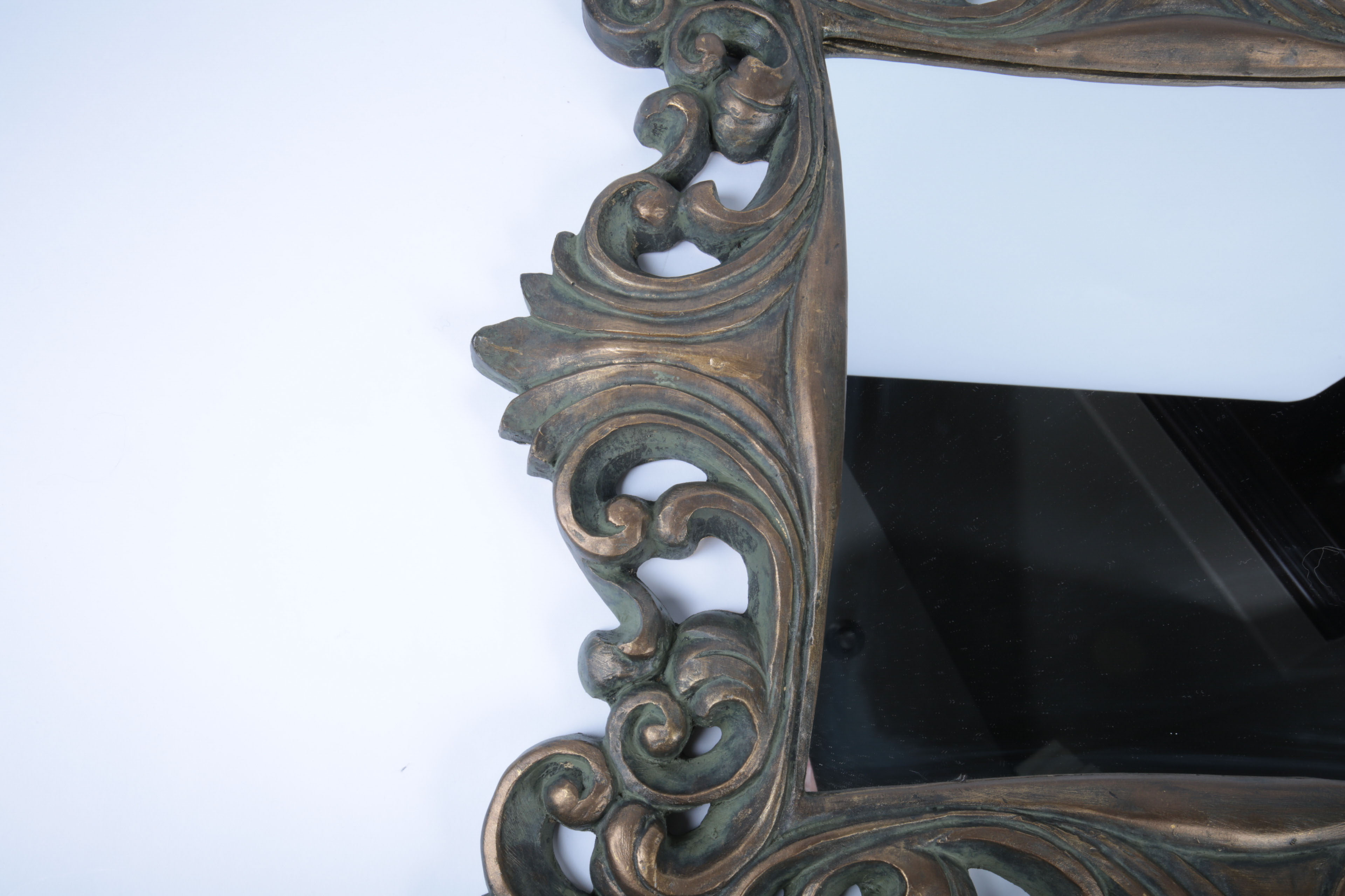 Collection of Ornate Black and Gold Tone Decor