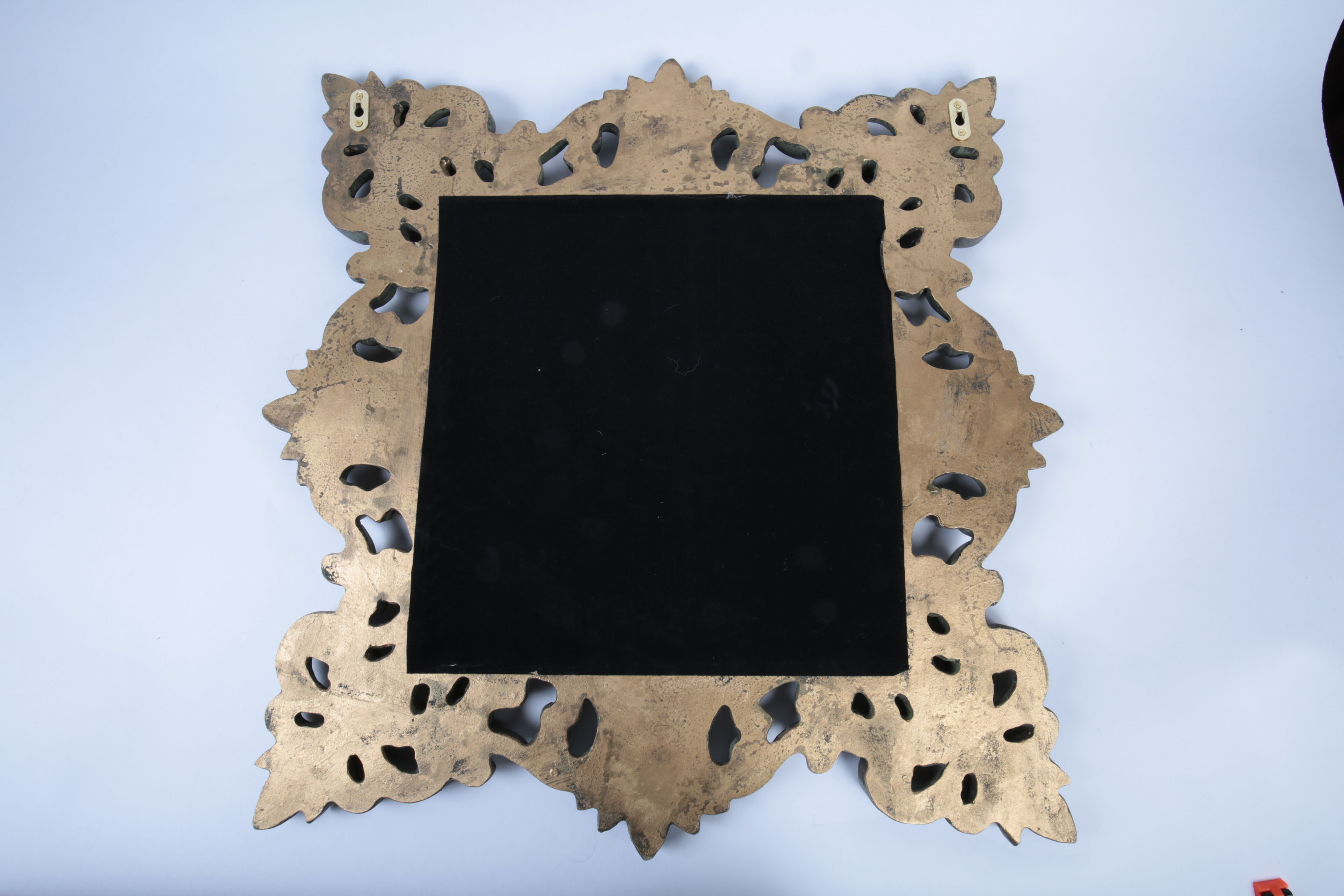 Collection of Ornate Black and Gold Tone Decor