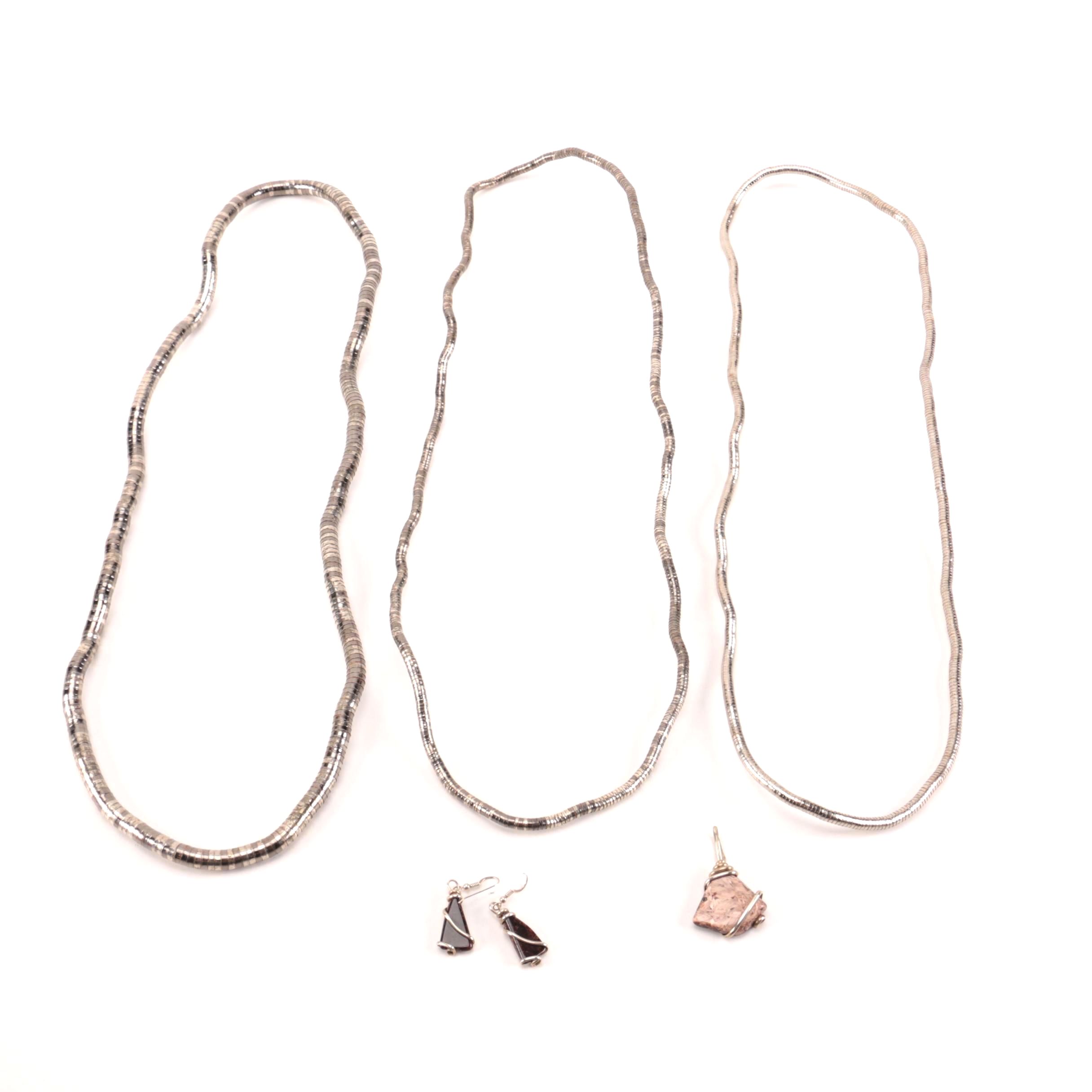 Costume Jewelry Including Pieces With Composite Stone