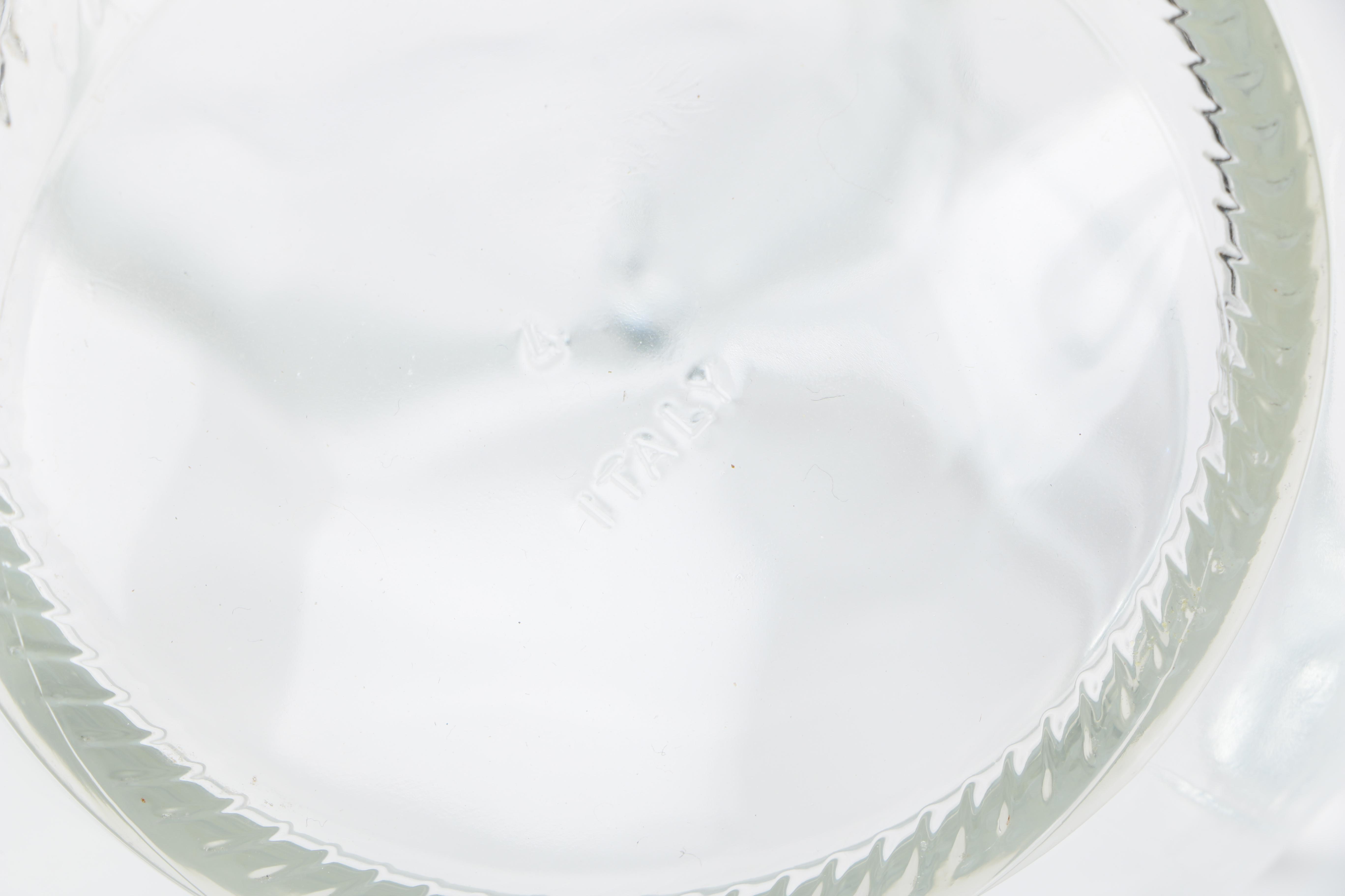 Two Clear Glass Decanters and a Pitcher