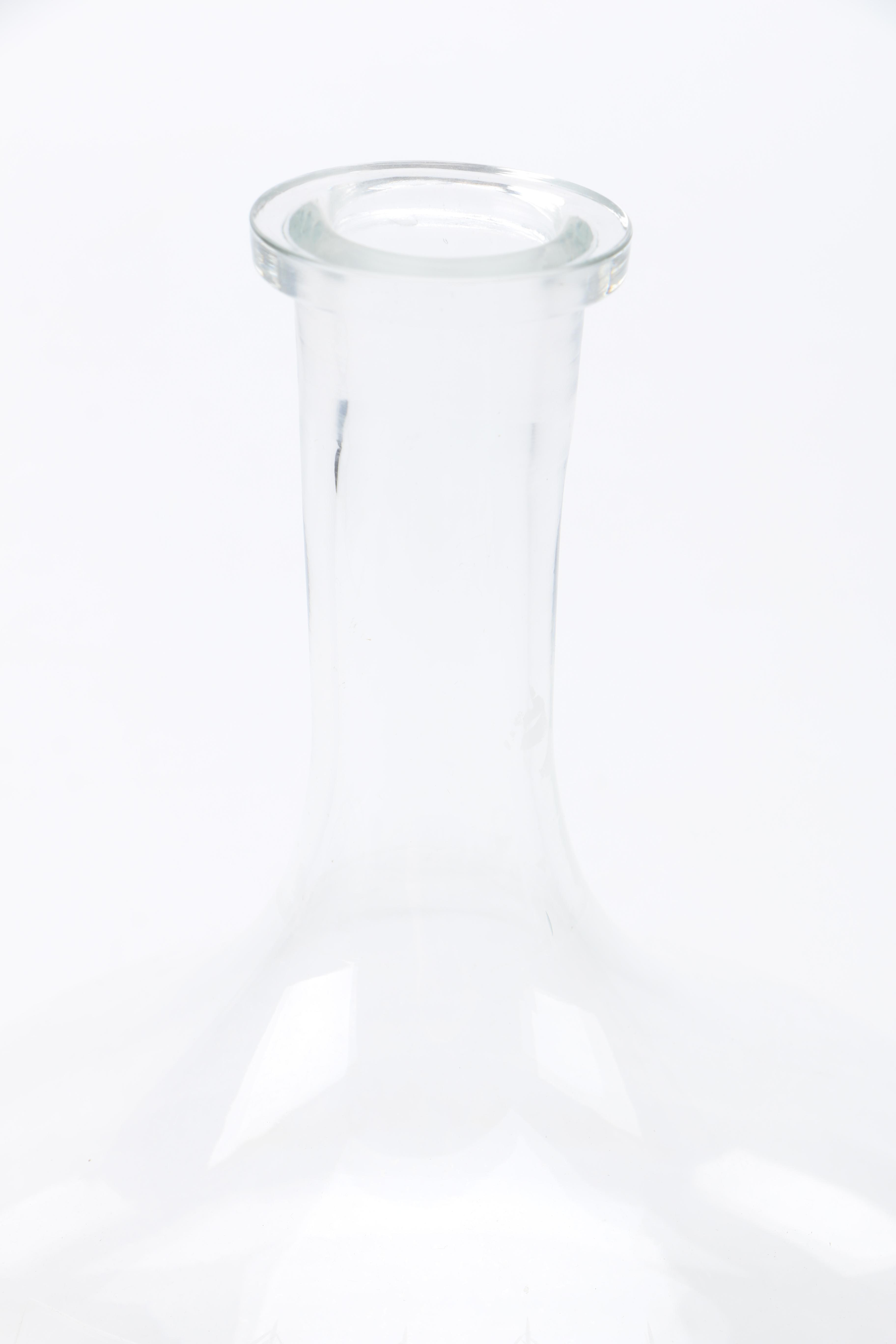 Two Clear Glass Decanters and a Pitcher