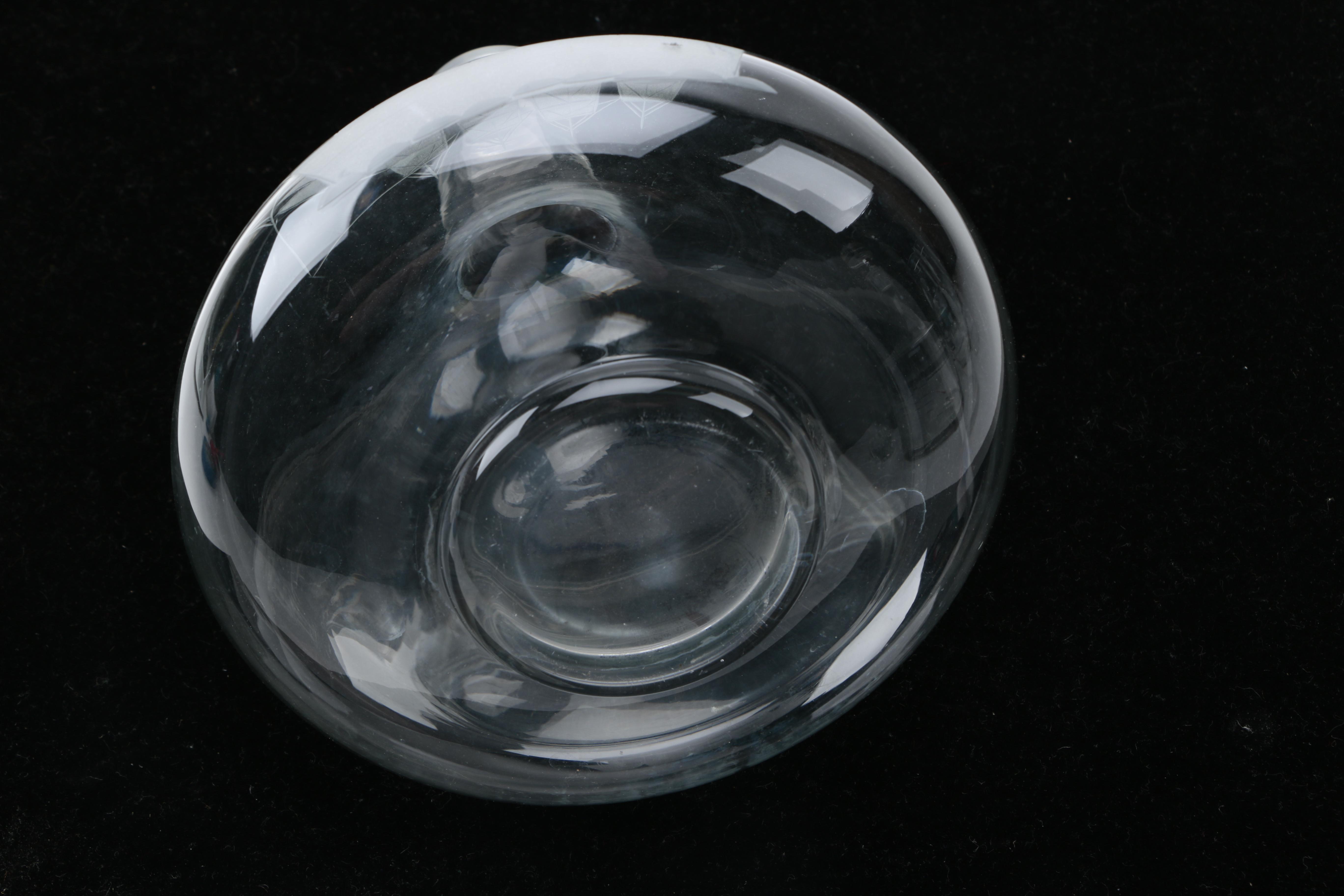 Two Clear Glass Decanters and a Pitcher