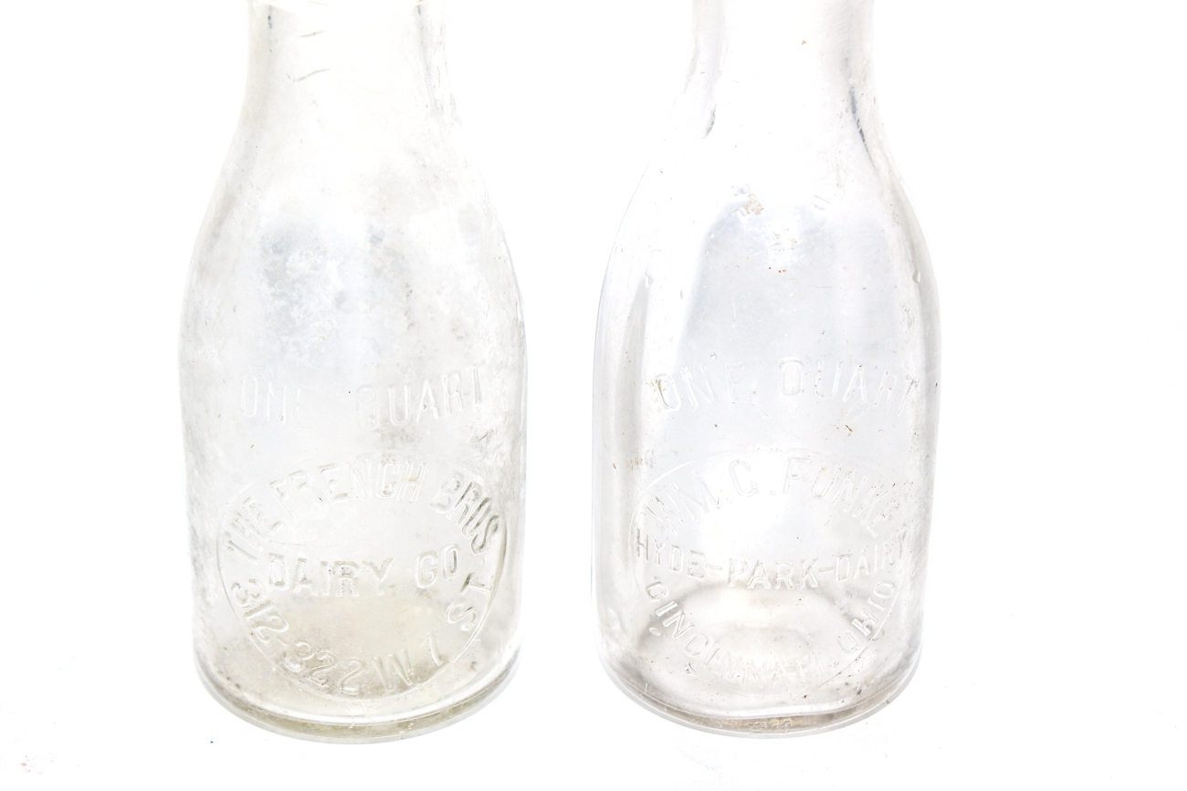 Eight Vintage Milk Jugs in Metal Delivery Basket