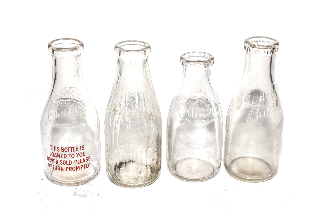 Eight Vintage Milk Jugs in Metal Delivery Basket