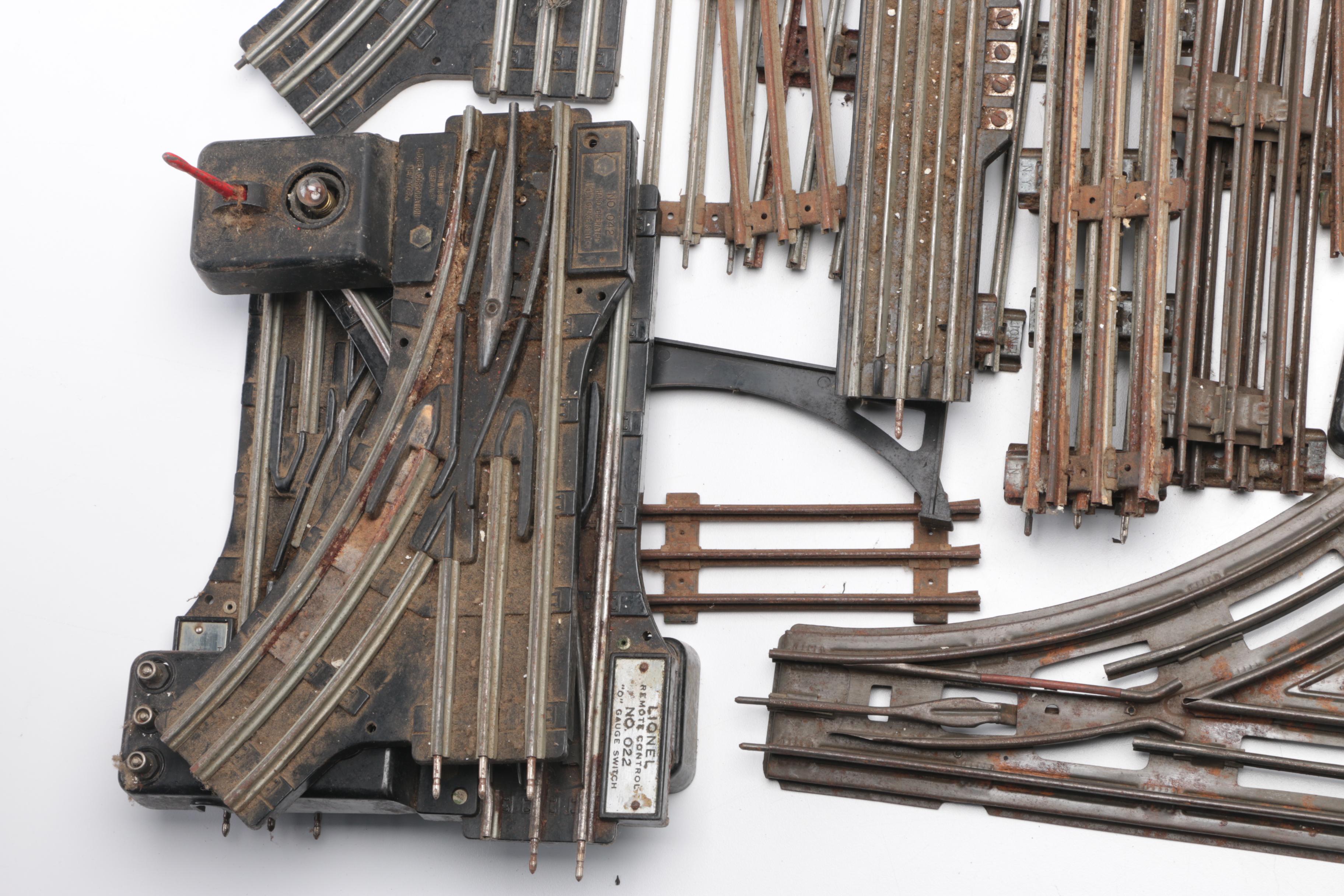 Collection of Train Tracks and Other Train Accessories