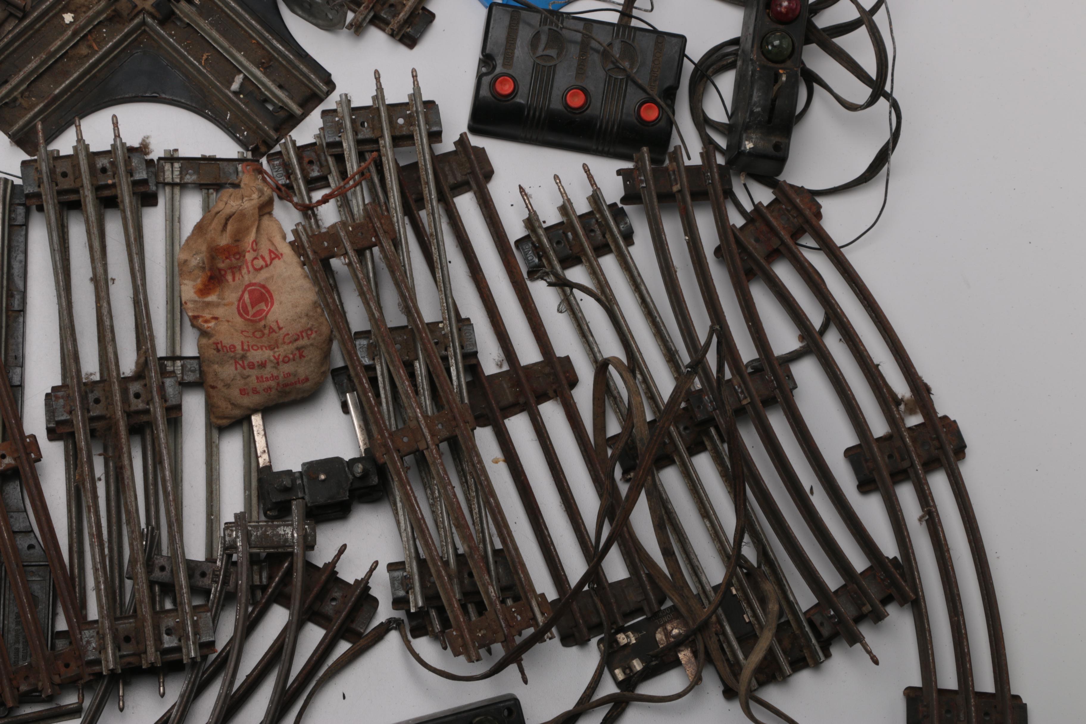 Collection of Train Tracks and Other Train Accessories