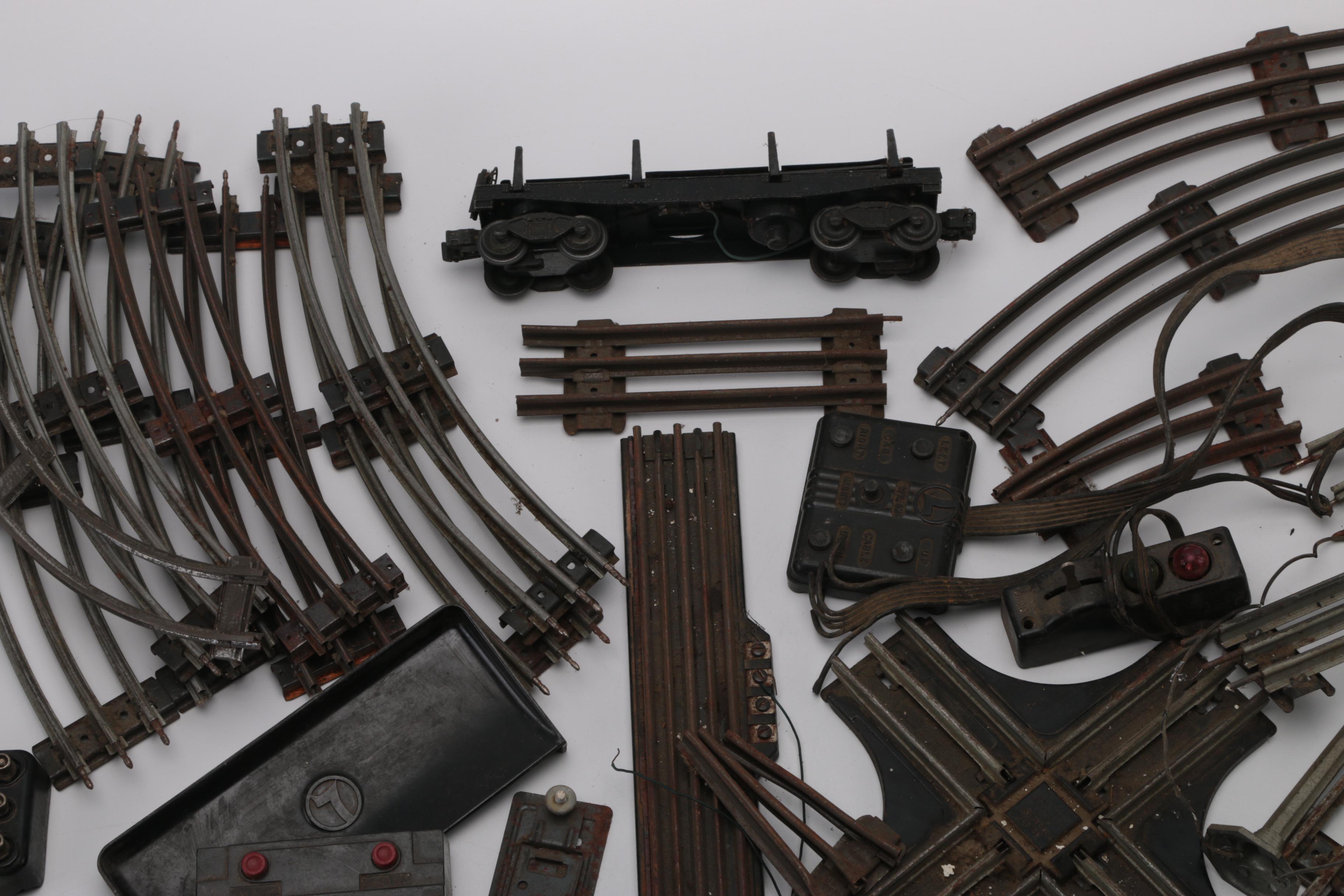 Collection of Train Tracks and Other Train Accessories