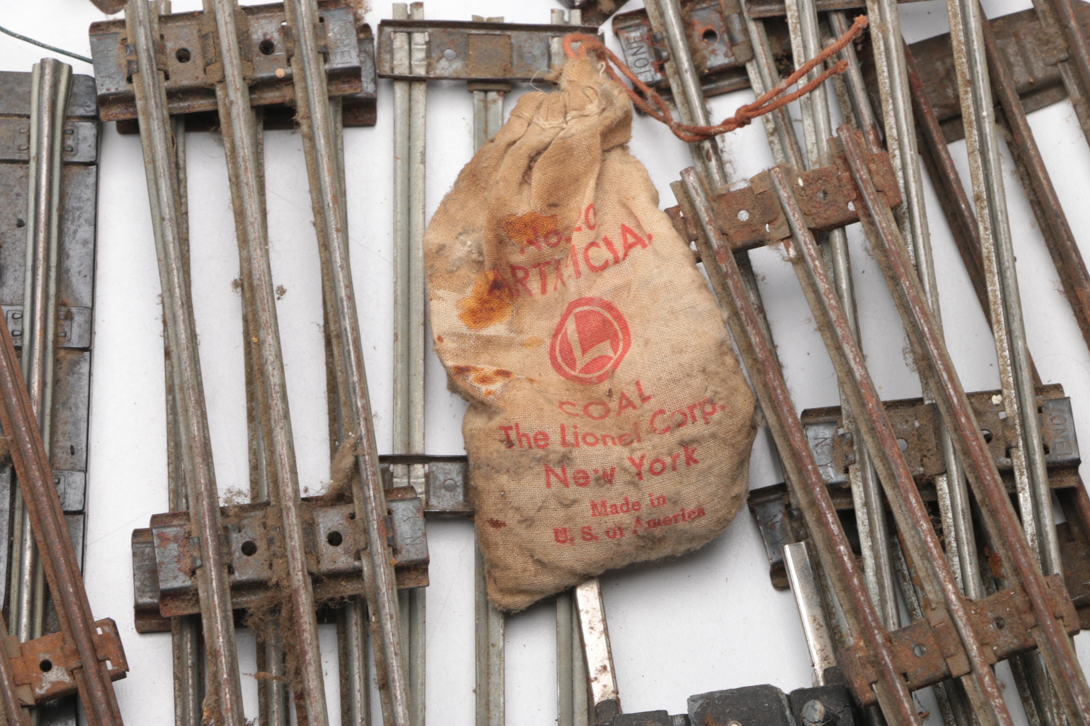 Collection of Train Tracks and Other Train Accessories