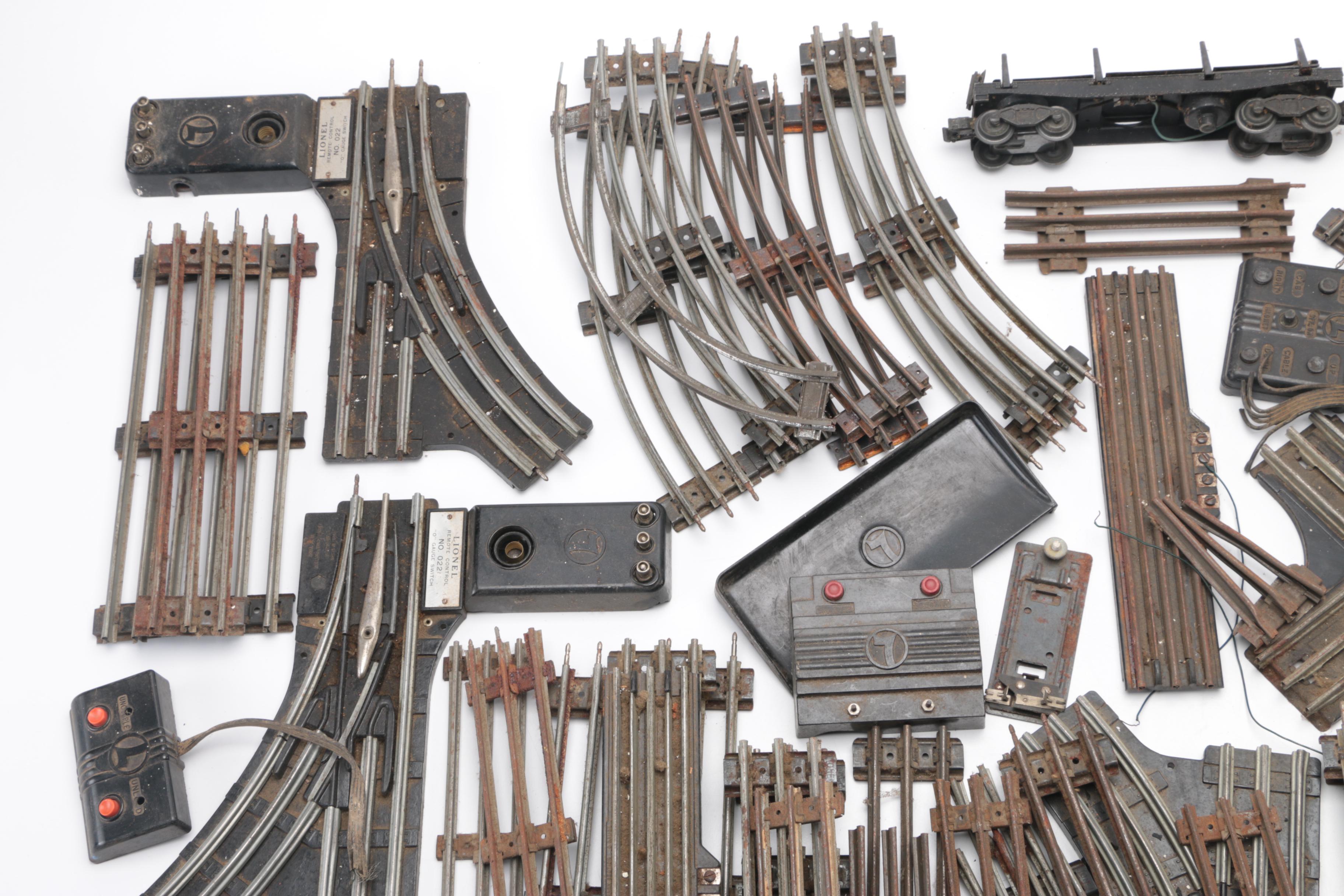 Collection of Train Tracks and Other Train Accessories