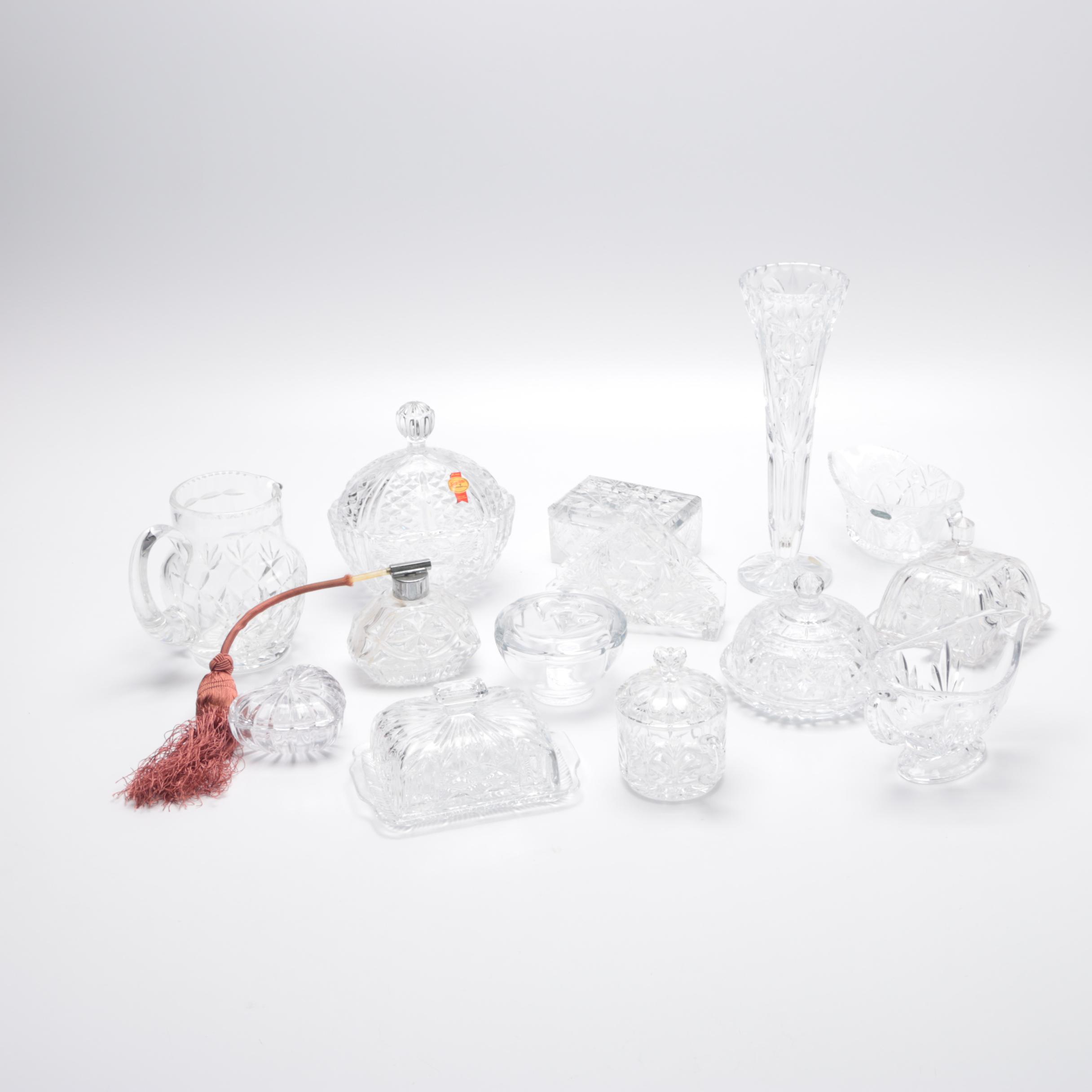 Generous Assortment of Crystal Pieces and Tableware