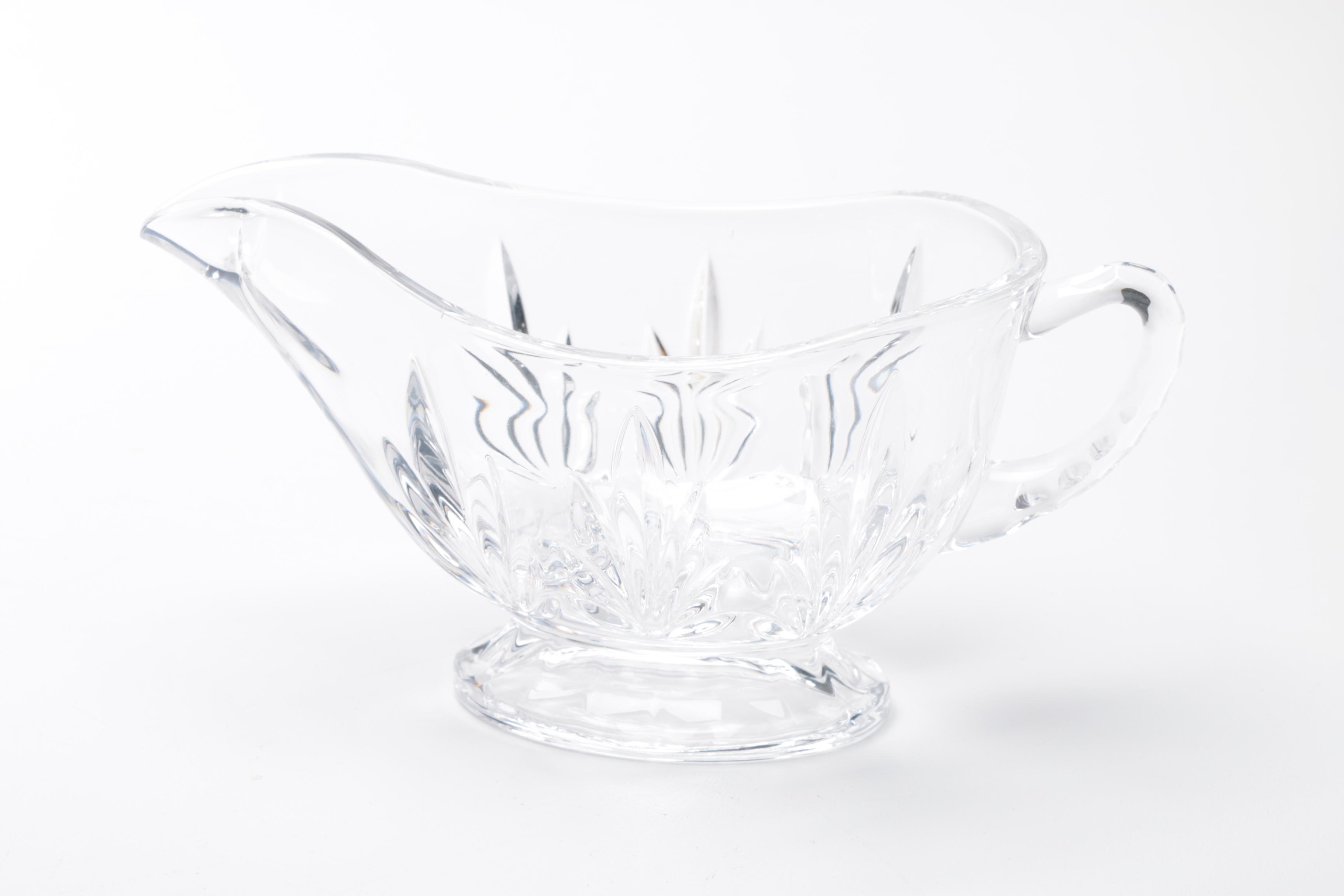 Generous Assortment of Crystal Pieces and Tableware