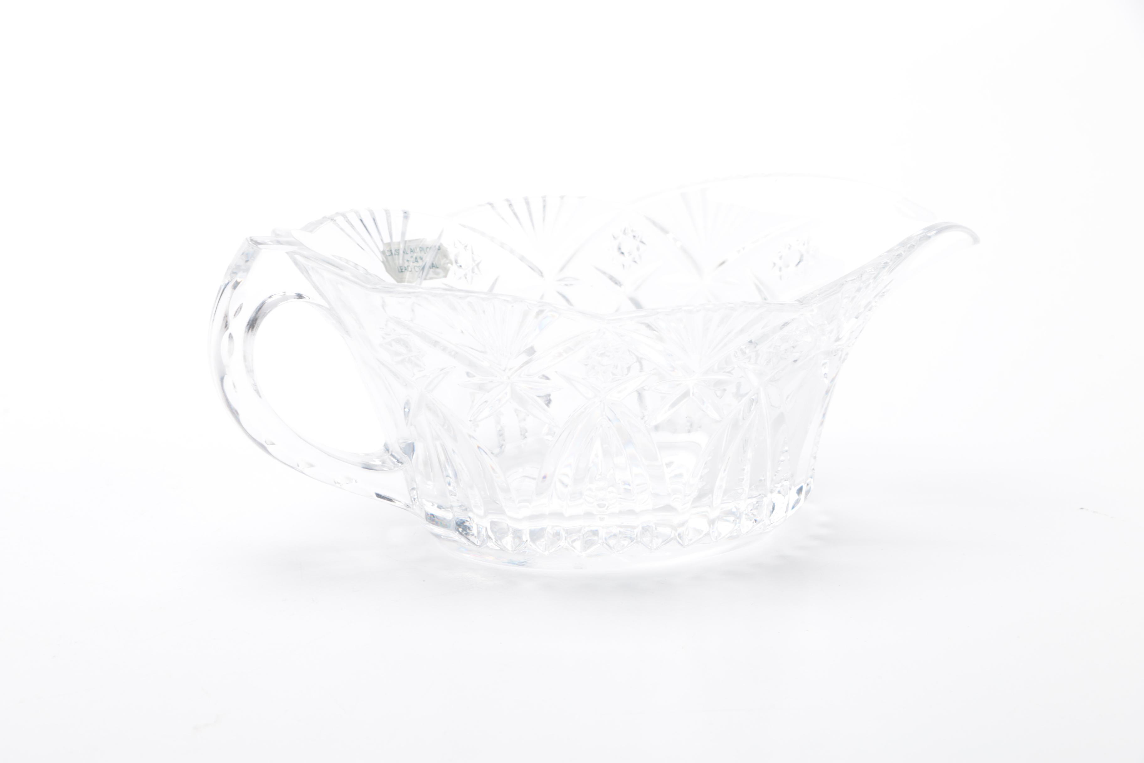 Generous Assortment of Crystal Pieces and Tableware