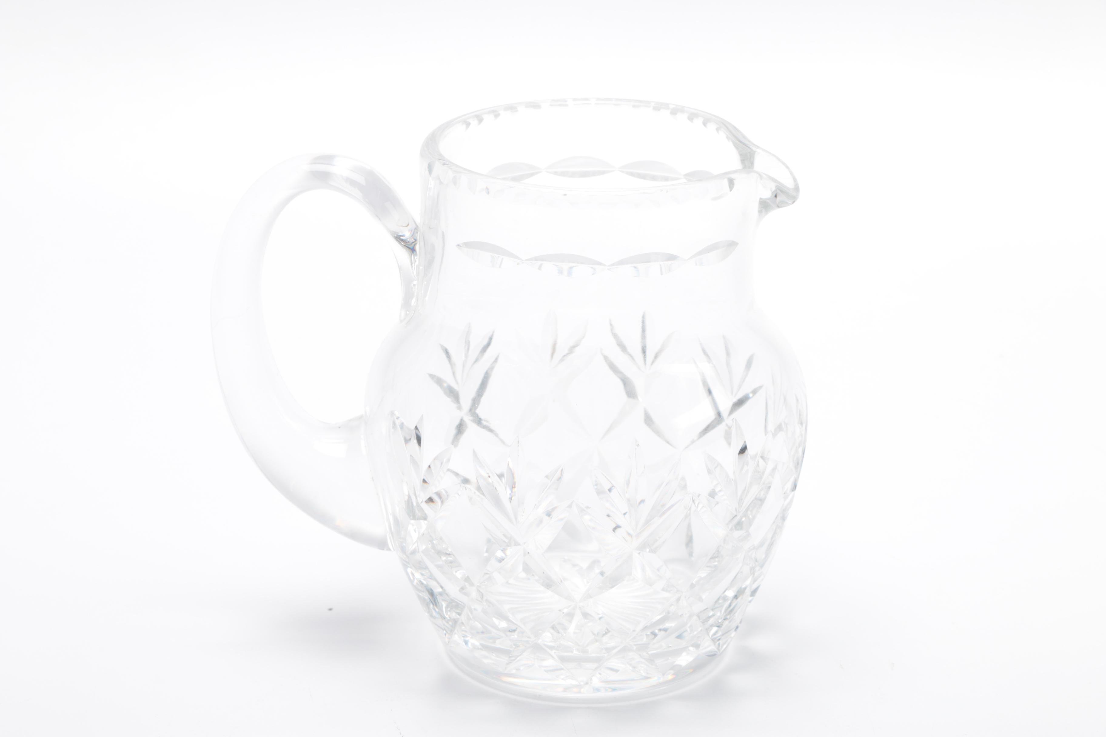 Generous Assortment of Crystal Pieces and Tableware