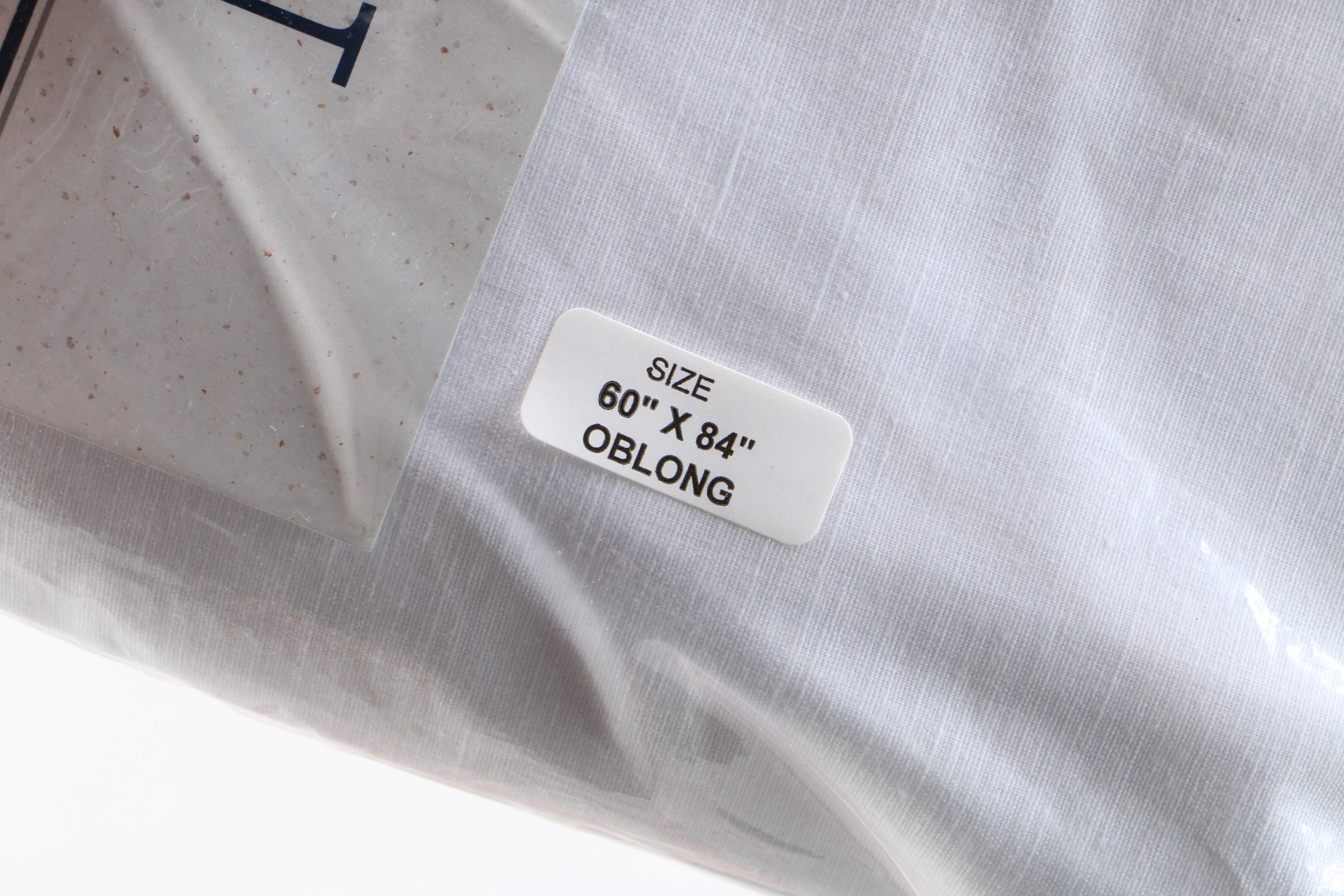 Assorted Tablecloths and Additional Linens