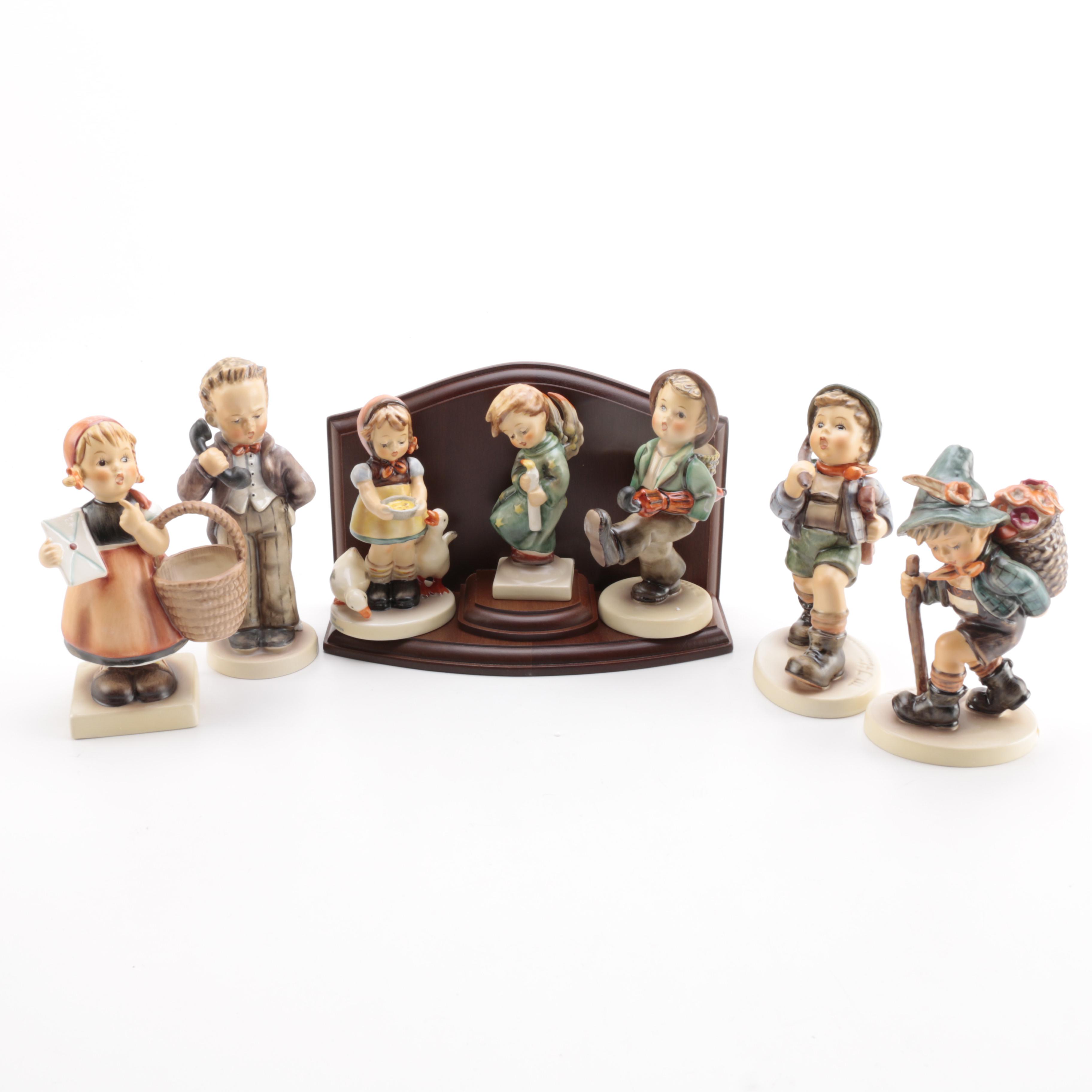 Collection of Goebel Hummel including "Flower Vendor" and "The Run-A-Way" Porcelain Figurines