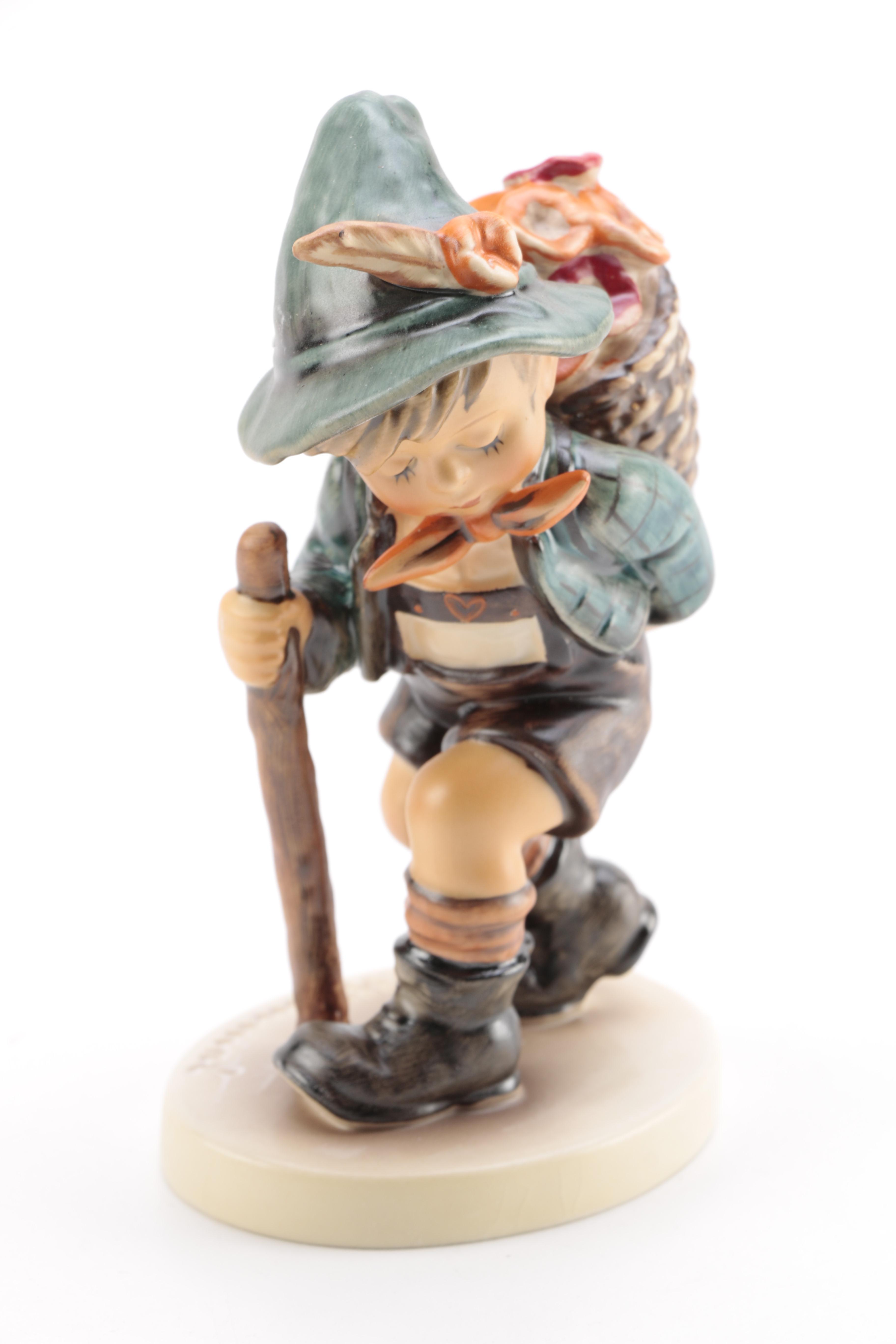Collection of Goebel Hummel including "Flower Vendor" and "The Run-A-Way" Porcelain Figurines