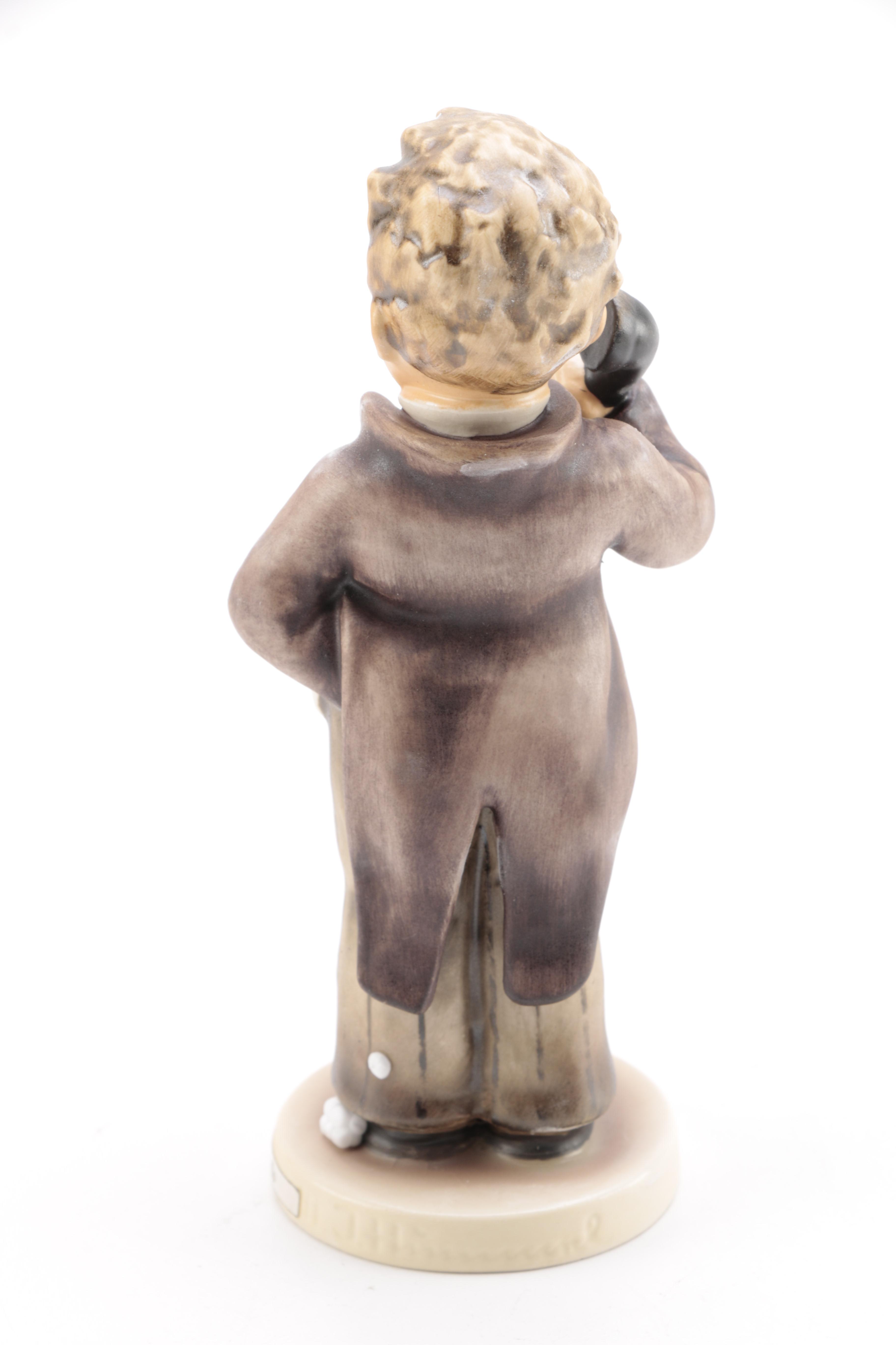 Collection of Goebel Hummel including "Flower Vendor" and "The Run-A-Way" Porcelain Figurines