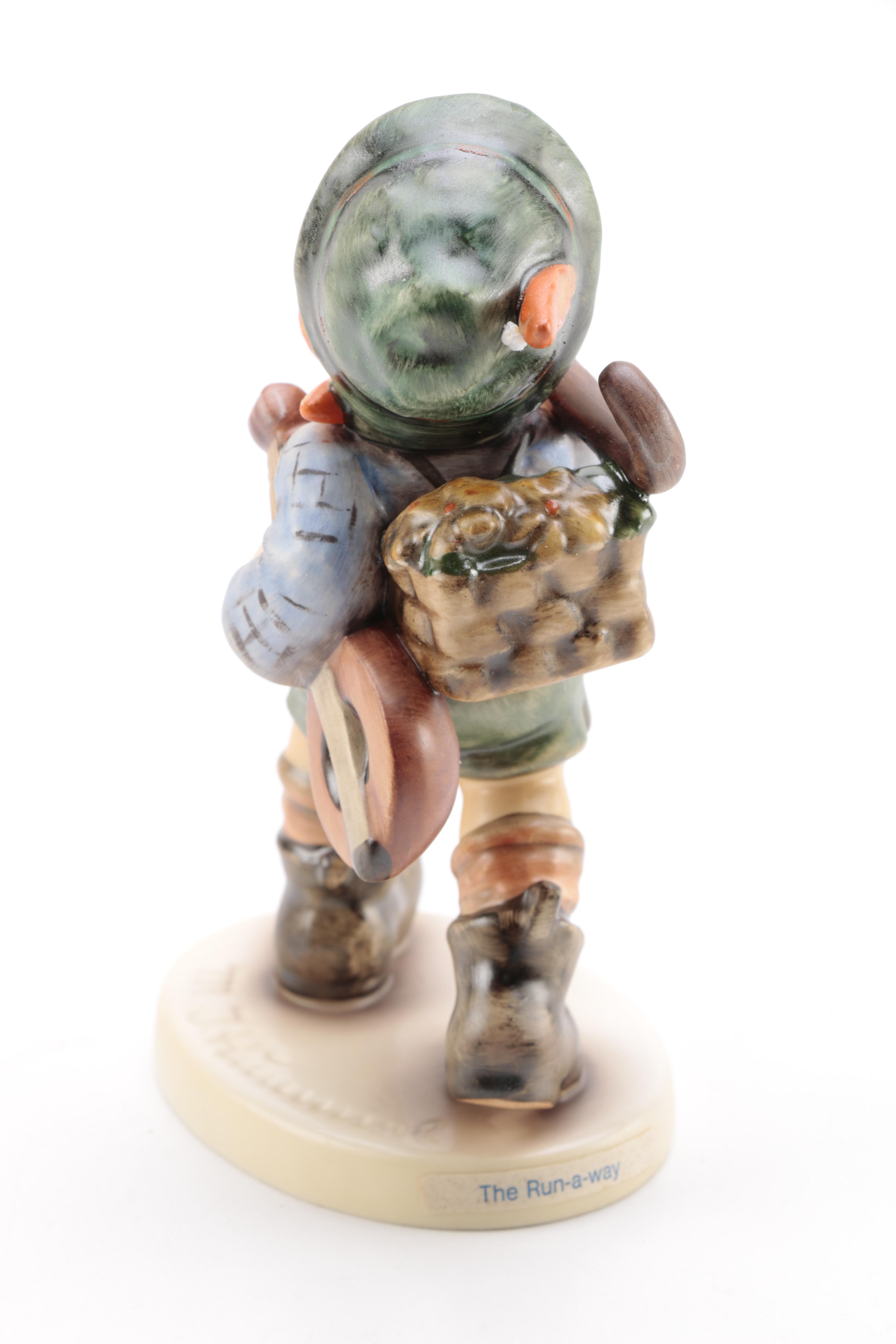 Collection of Goebel Hummel including "Flower Vendor" and "The Run-A-Way" Porcelain Figurines