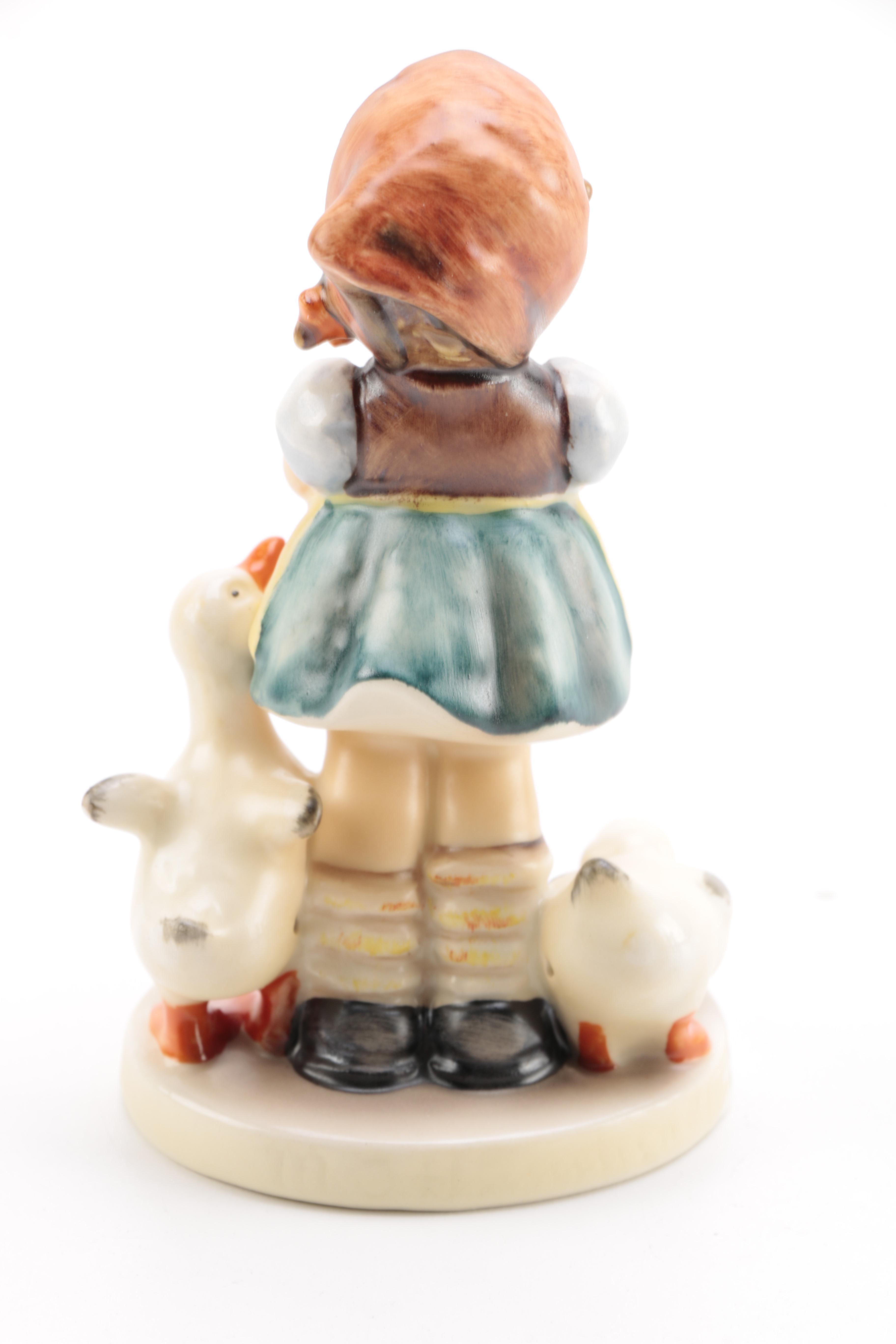 Collection of Goebel Hummel including "Flower Vendor" and "The Run-A-Way" Porcelain Figurines