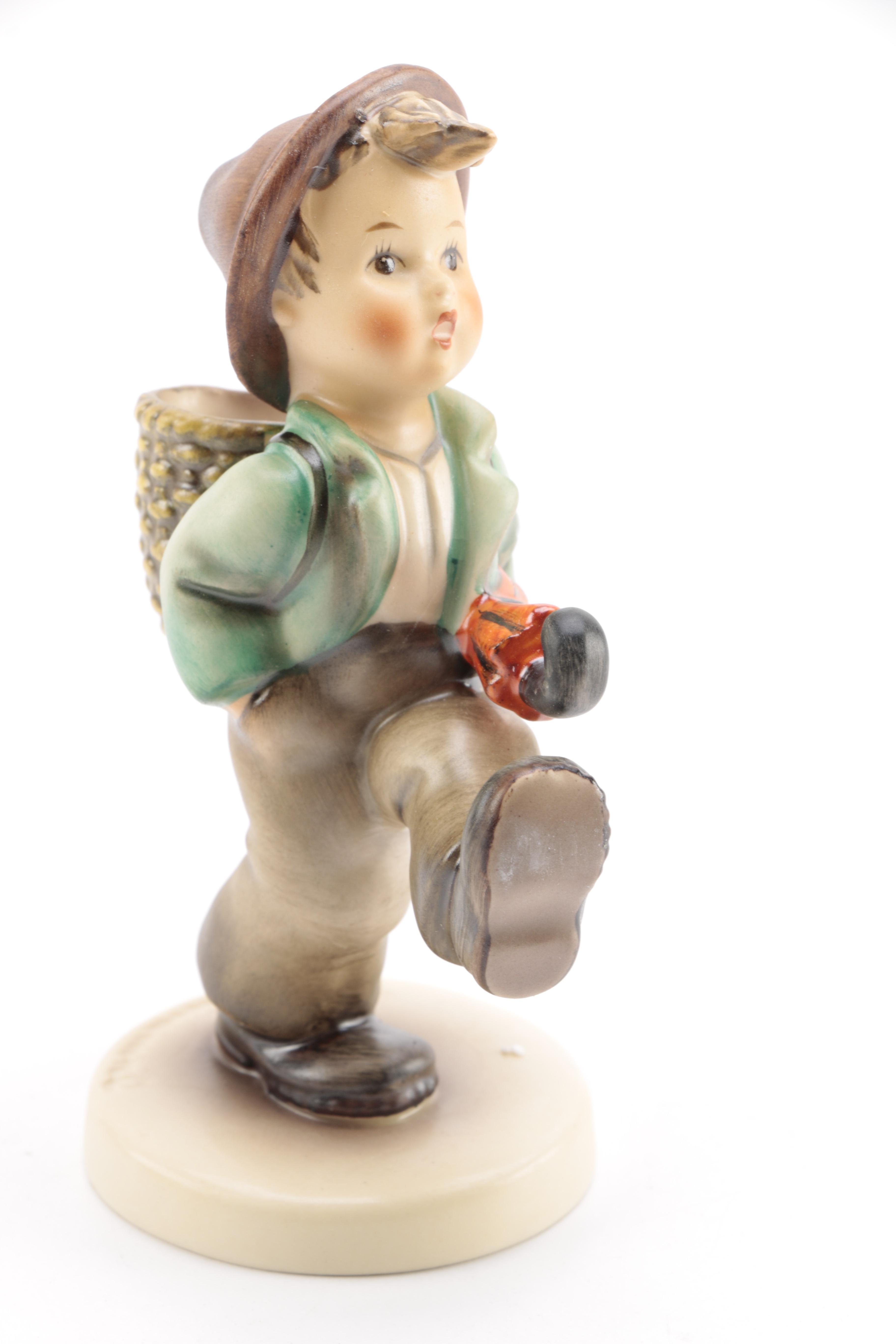 Collection of Goebel Hummel including "Flower Vendor" and "The Run-A-Way" Porcelain Figurines