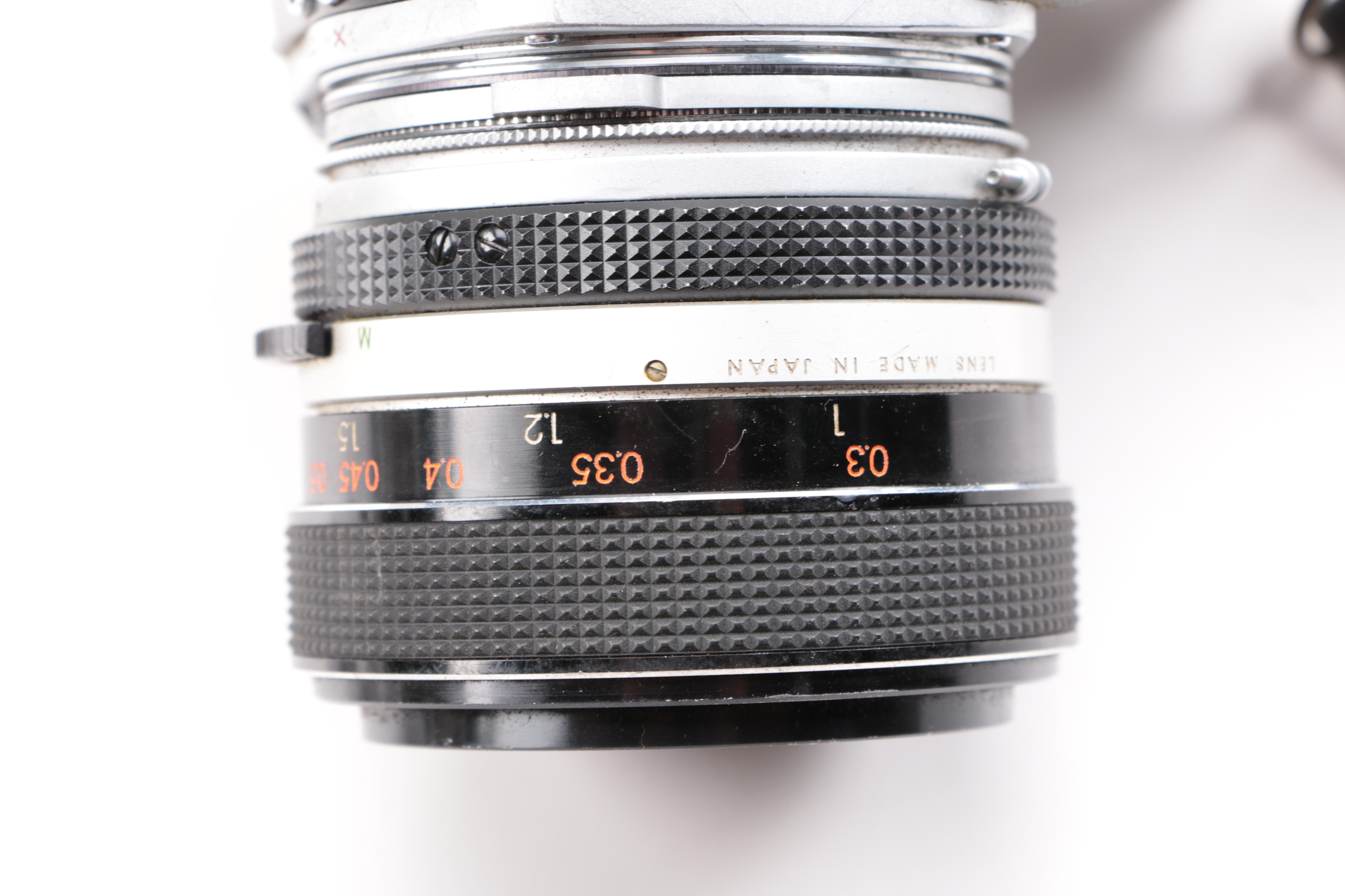 Keystone Video Camera and Minolta SR-T Camera with Accessories