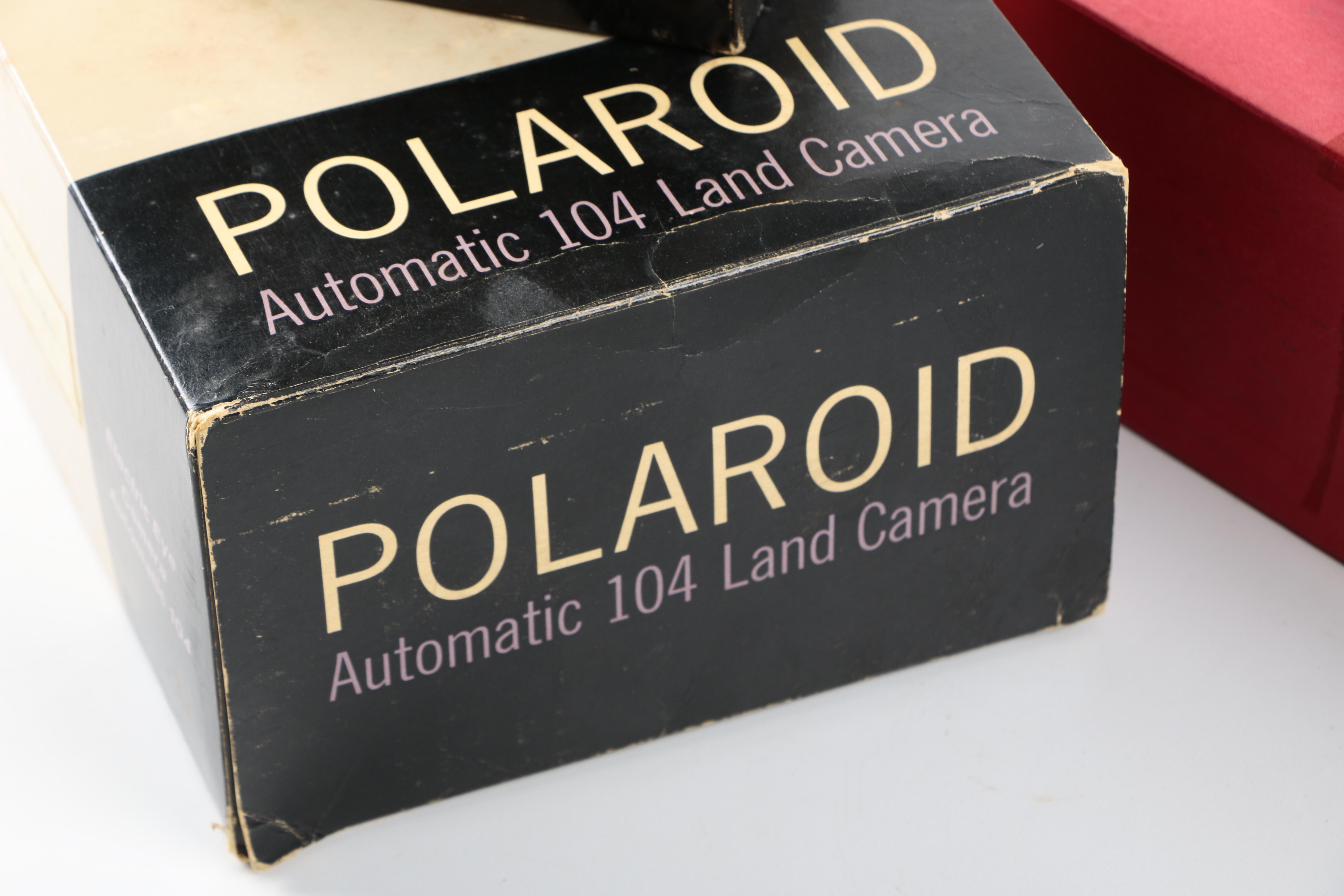 Two Cameras with Accessories