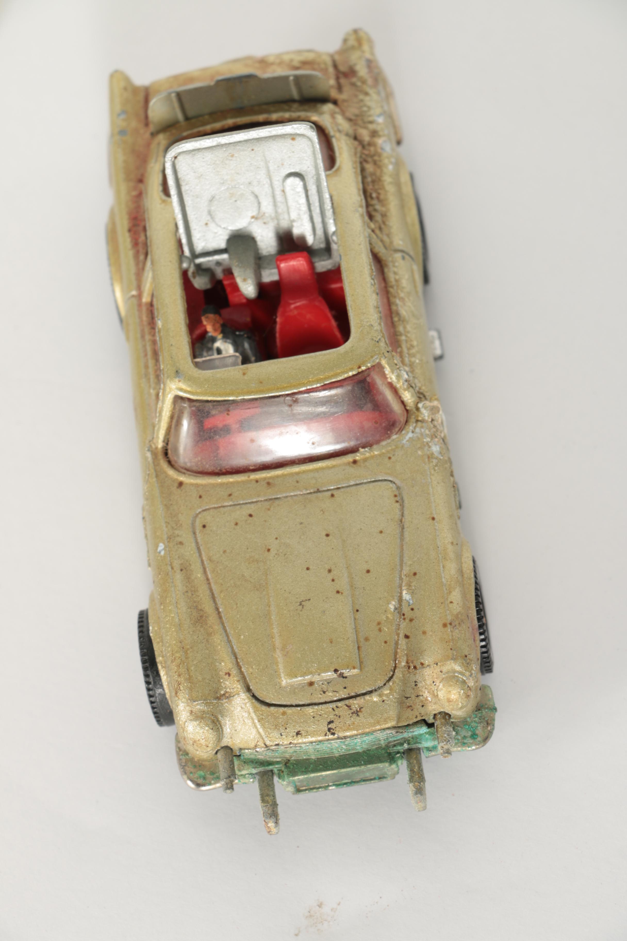 James Bond Film Festival "Thunderball" Poster and Corgi James Bond Aston Martin Die-Cast Car