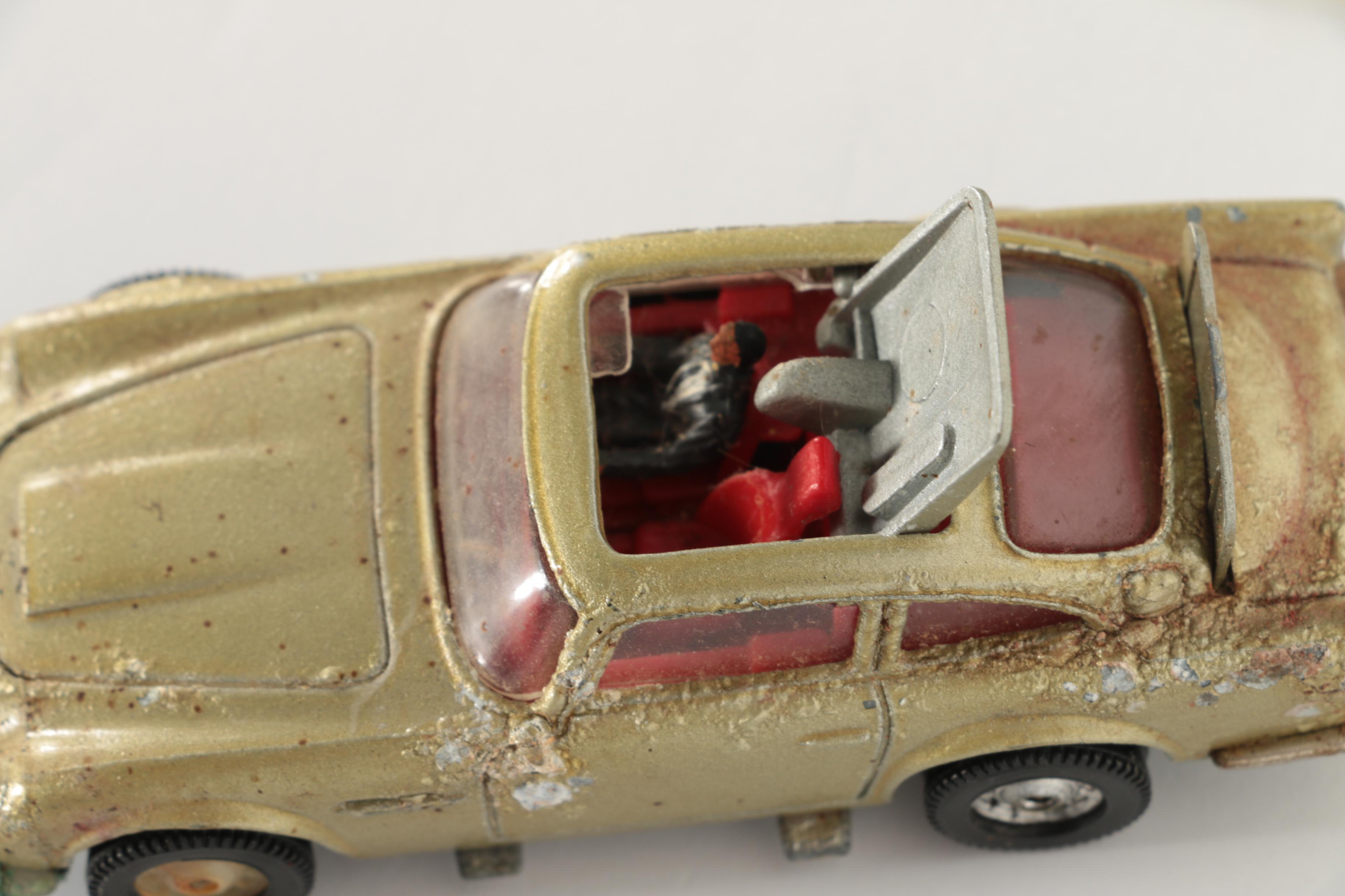 James Bond Film Festival "Thunderball" Poster and Corgi James Bond Aston Martin Die-Cast Car