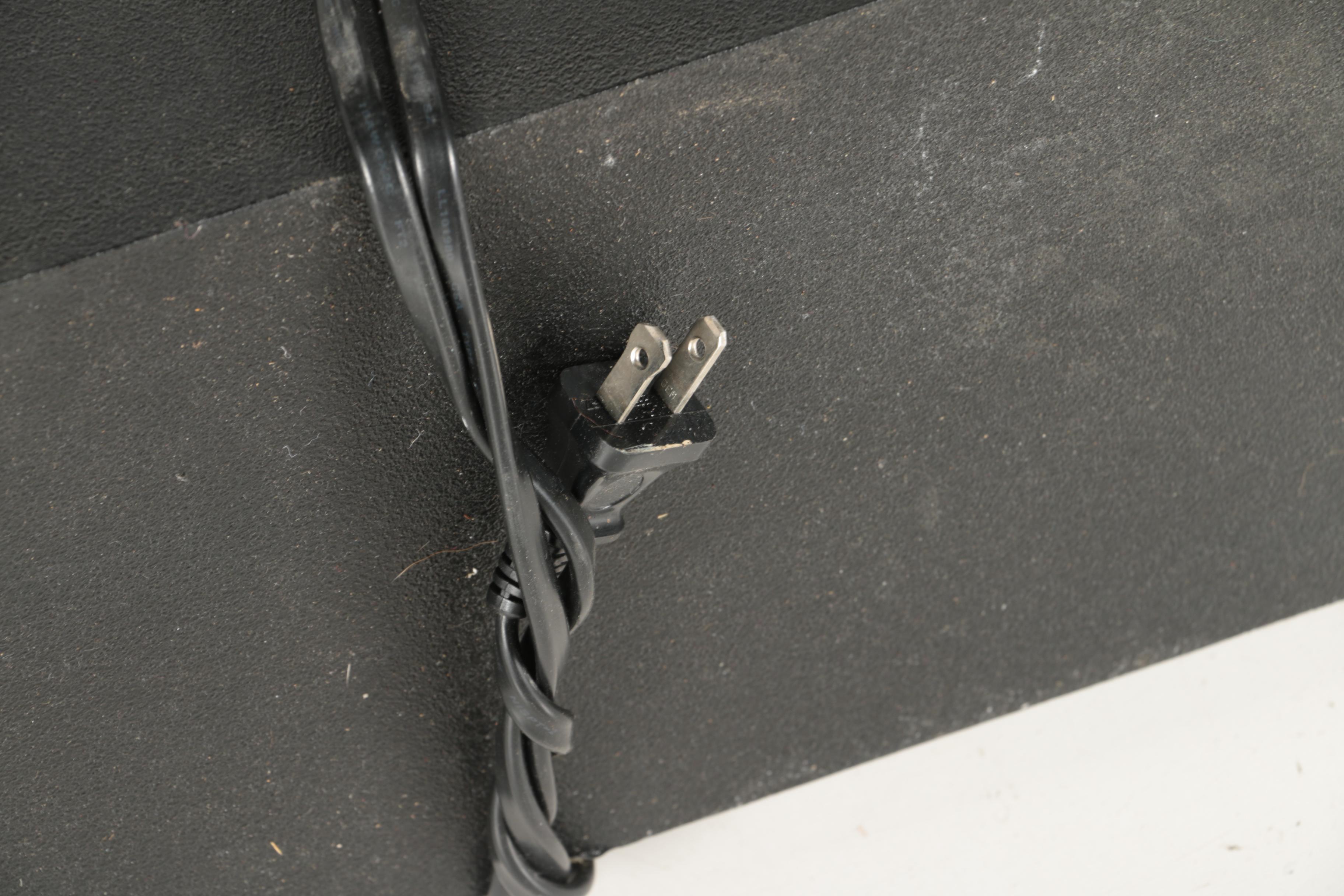 Two Black Bose Speakers