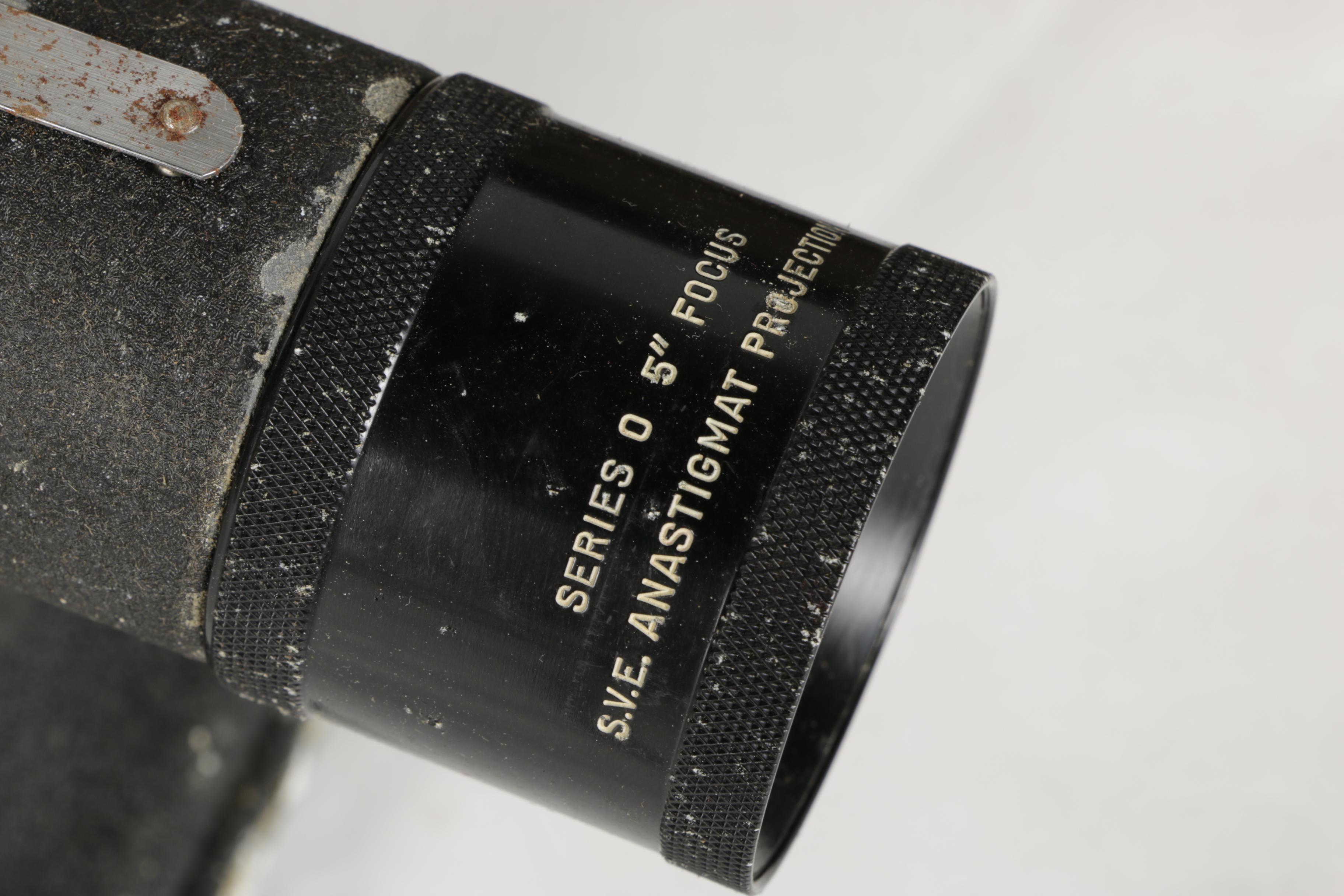 Four Vintage Projectors with Carrying Cases including Bell & Howell