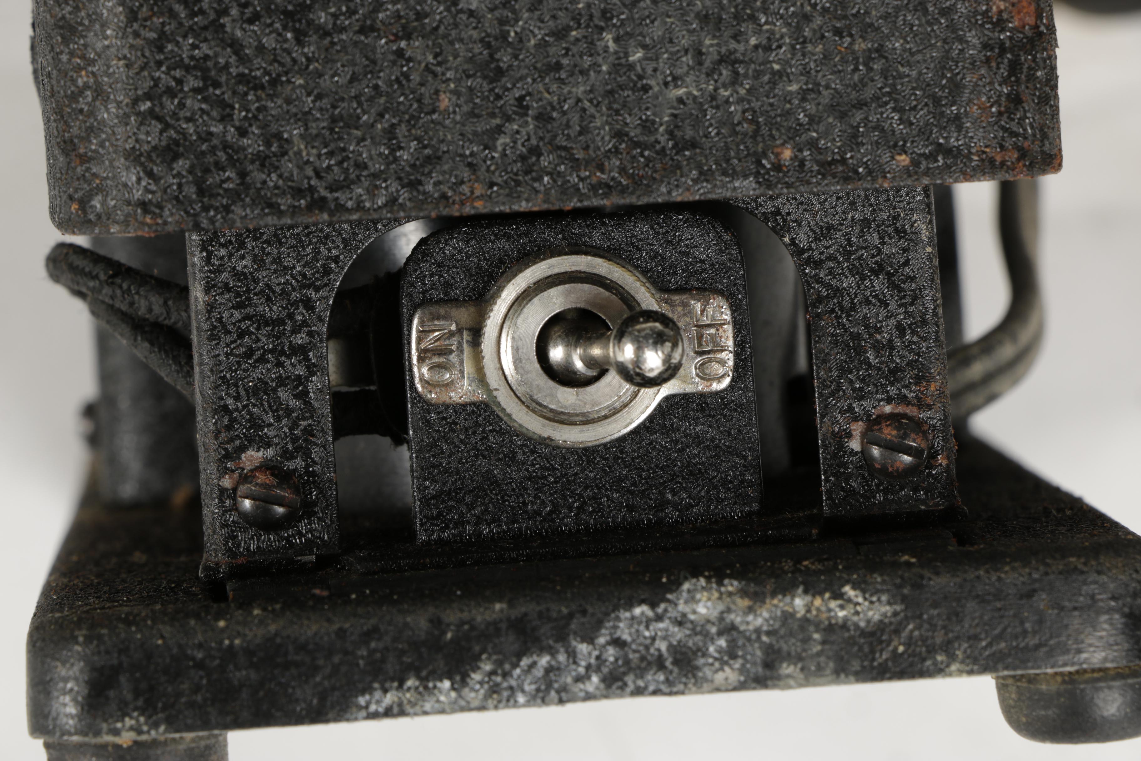 Four Vintage Projectors with Carrying Cases including Bell & Howell