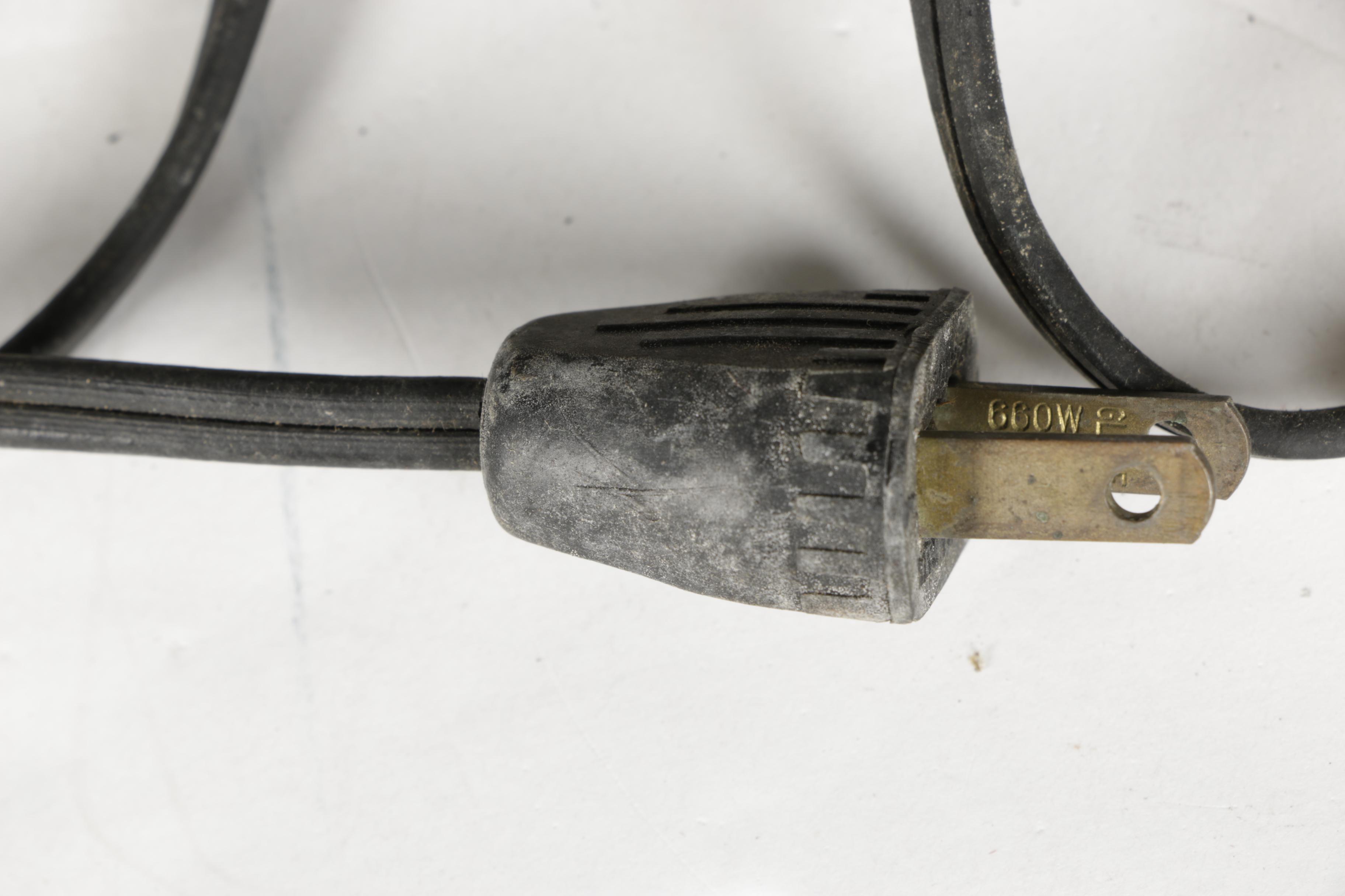 Four Vintage Projectors with Carrying Cases including Bell & Howell