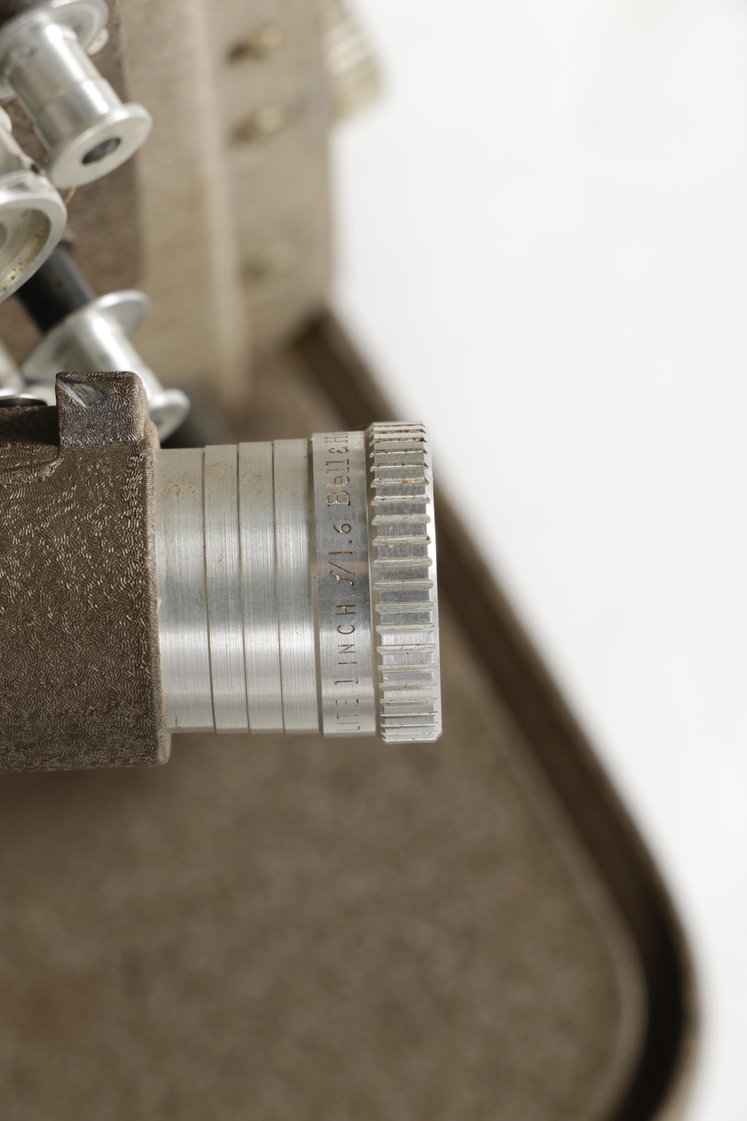 Four Vintage Projectors with Carrying Cases including Bell & Howell