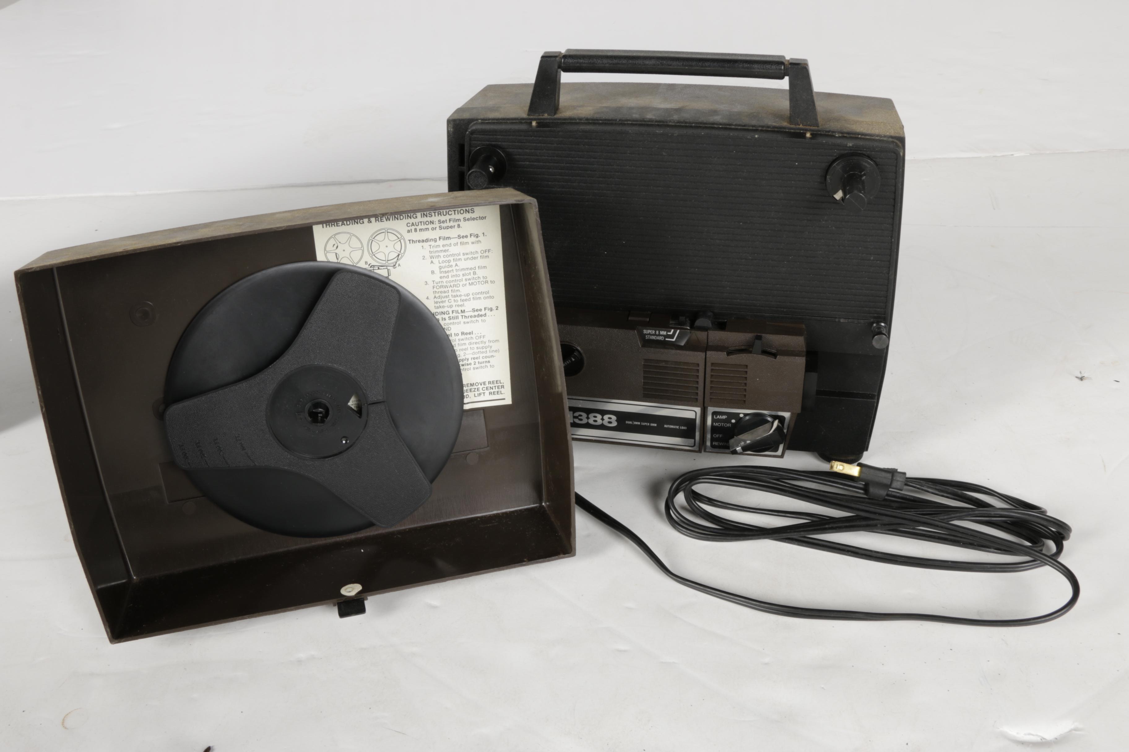Four Vintage Projectors with Carrying Cases including Bell & Howell