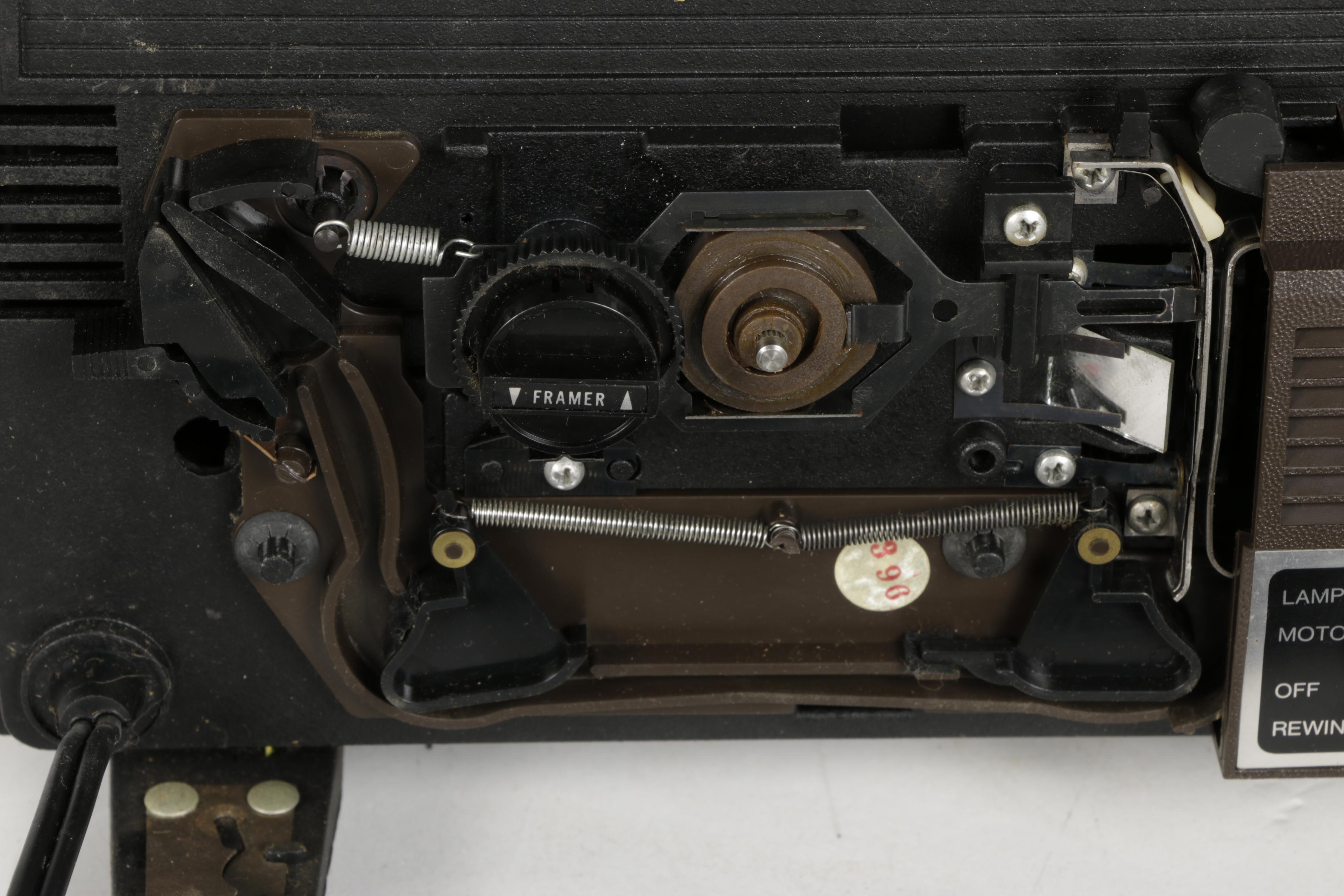 Four Vintage Projectors with Carrying Cases including Bell & Howell