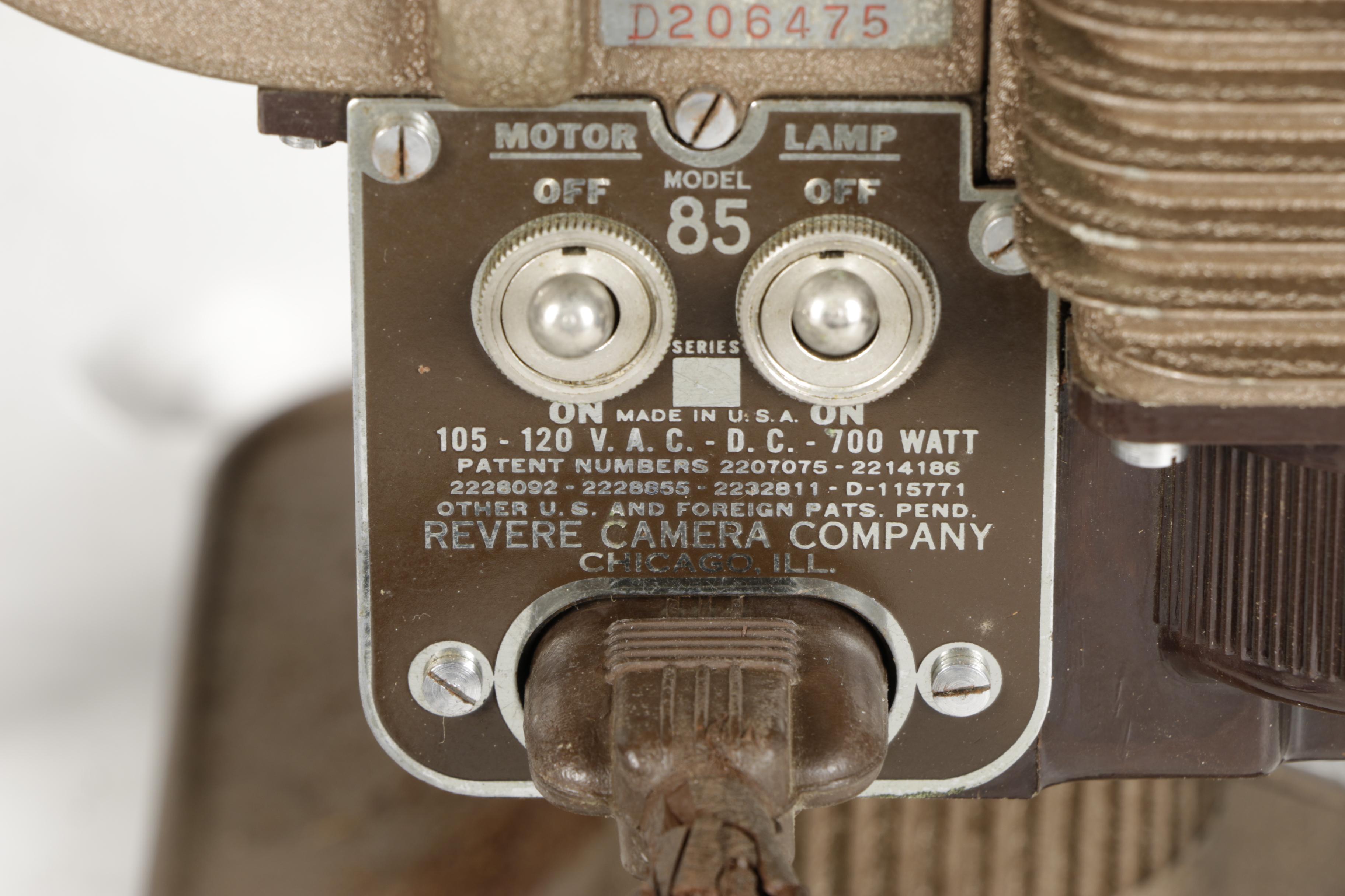 Four Vintage Projectors with Carrying Cases including Bell & Howell