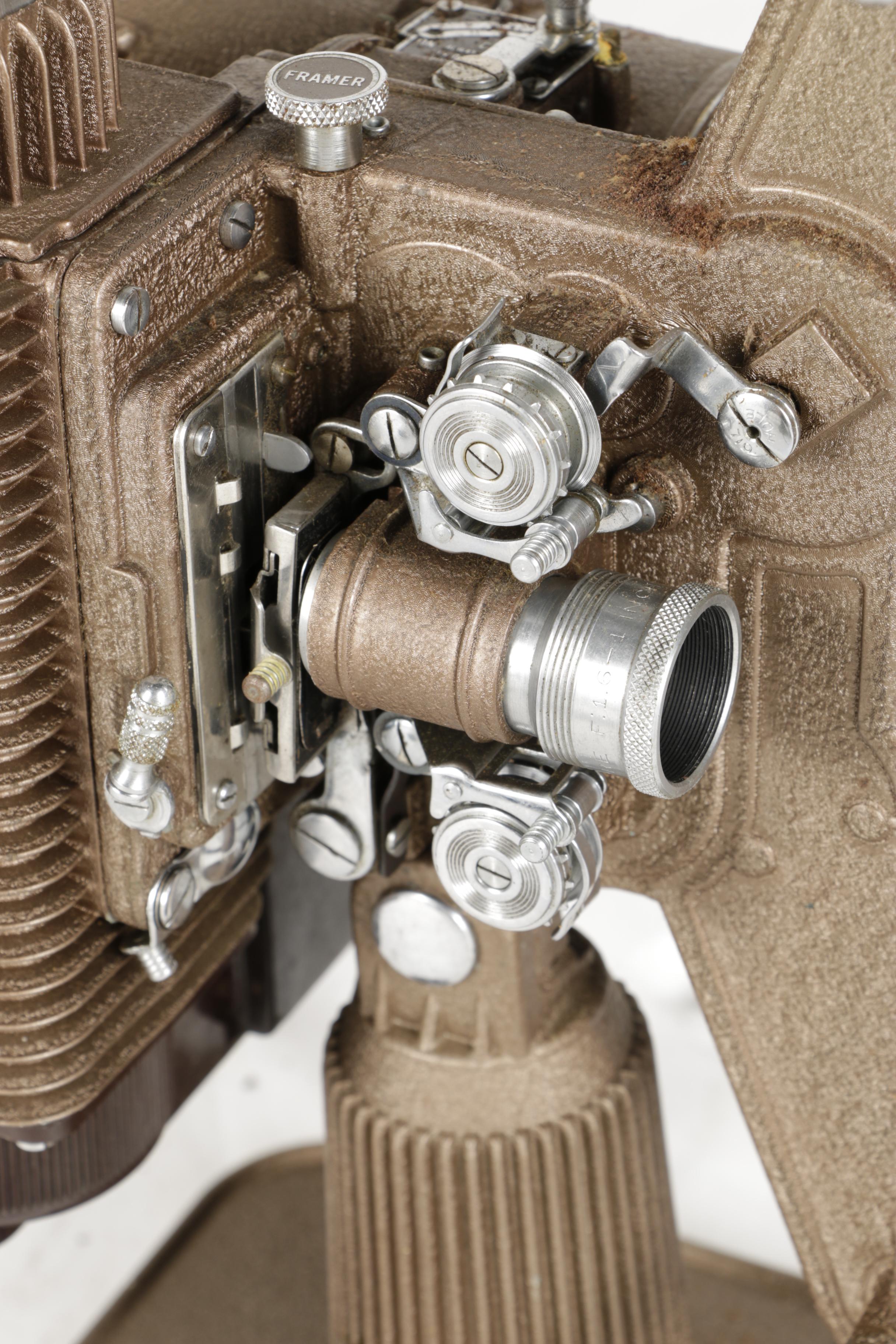 Four Vintage Projectors with Carrying Cases including Bell & Howell