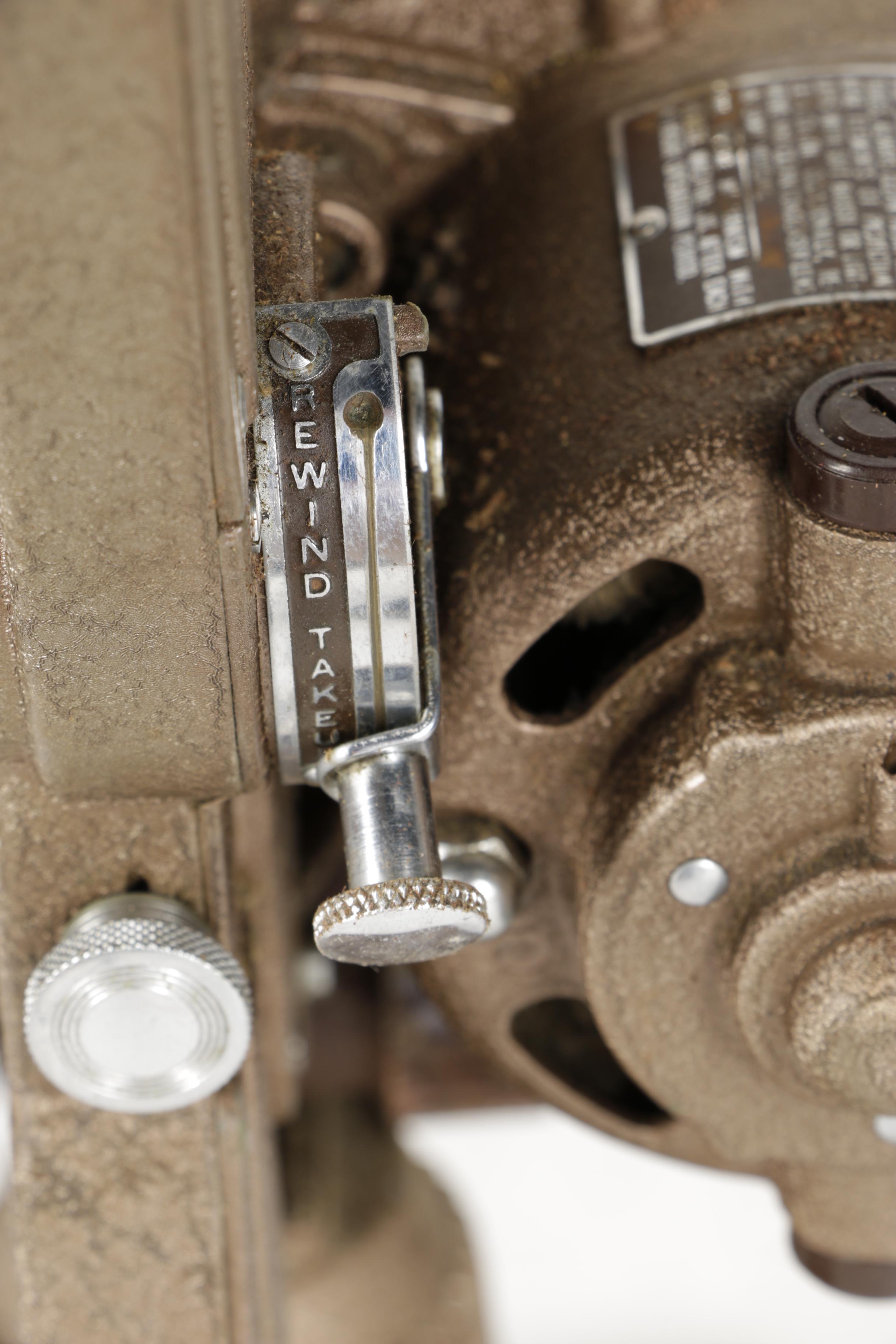 Four Vintage Projectors with Carrying Cases including Bell & Howell