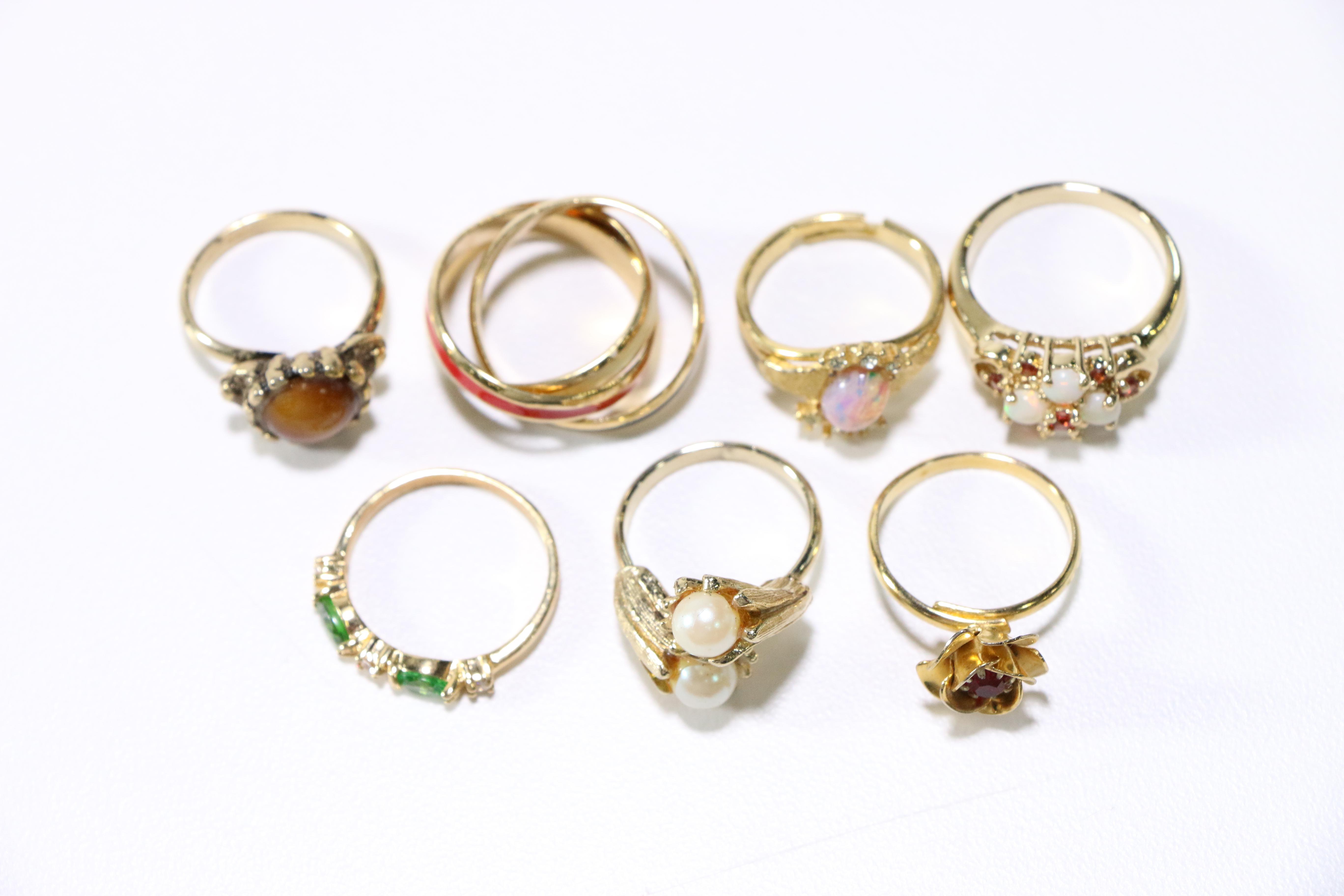 Assorted Gold Tone Rings and Brooches