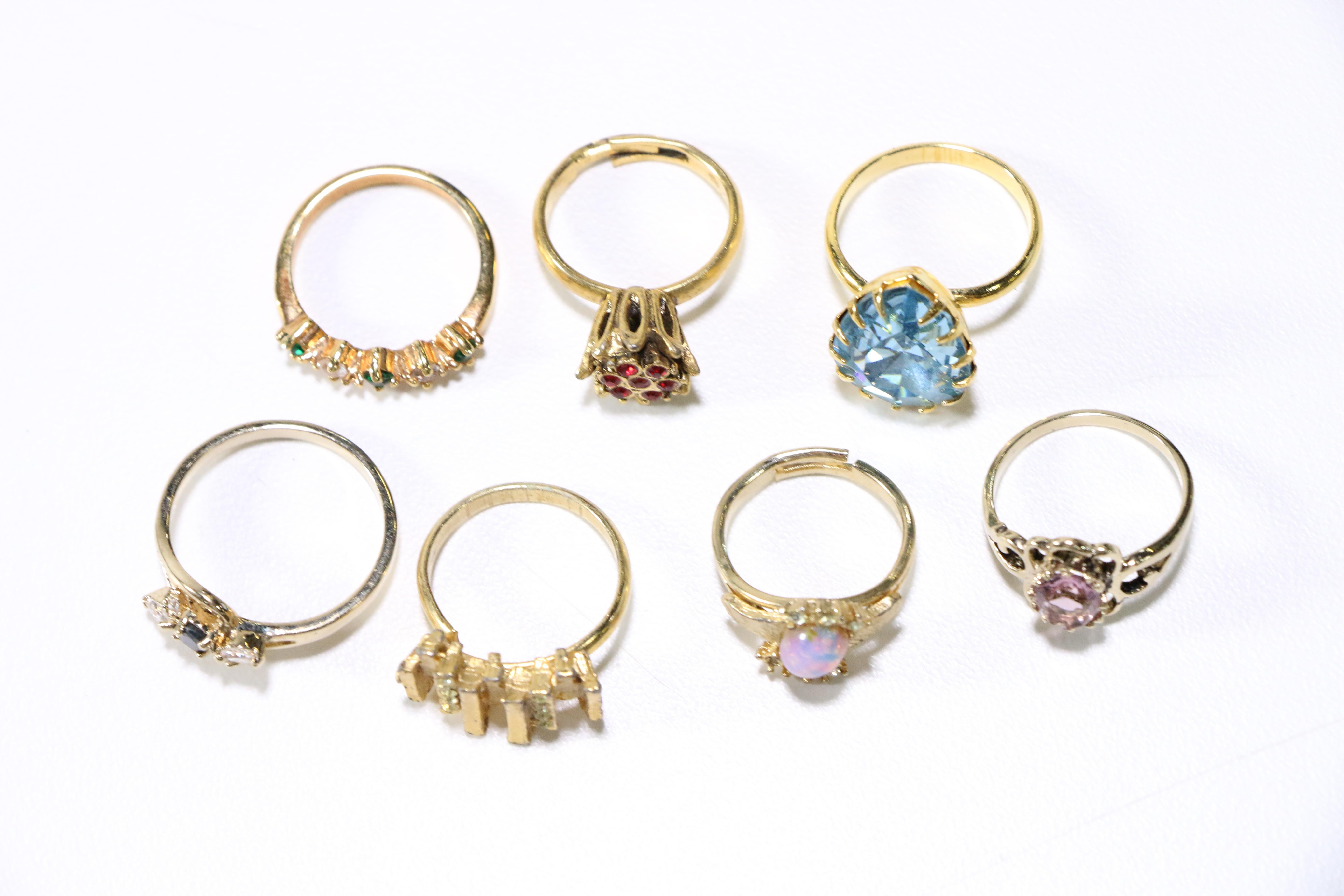Assorted Gold Tone Rings and Brooches