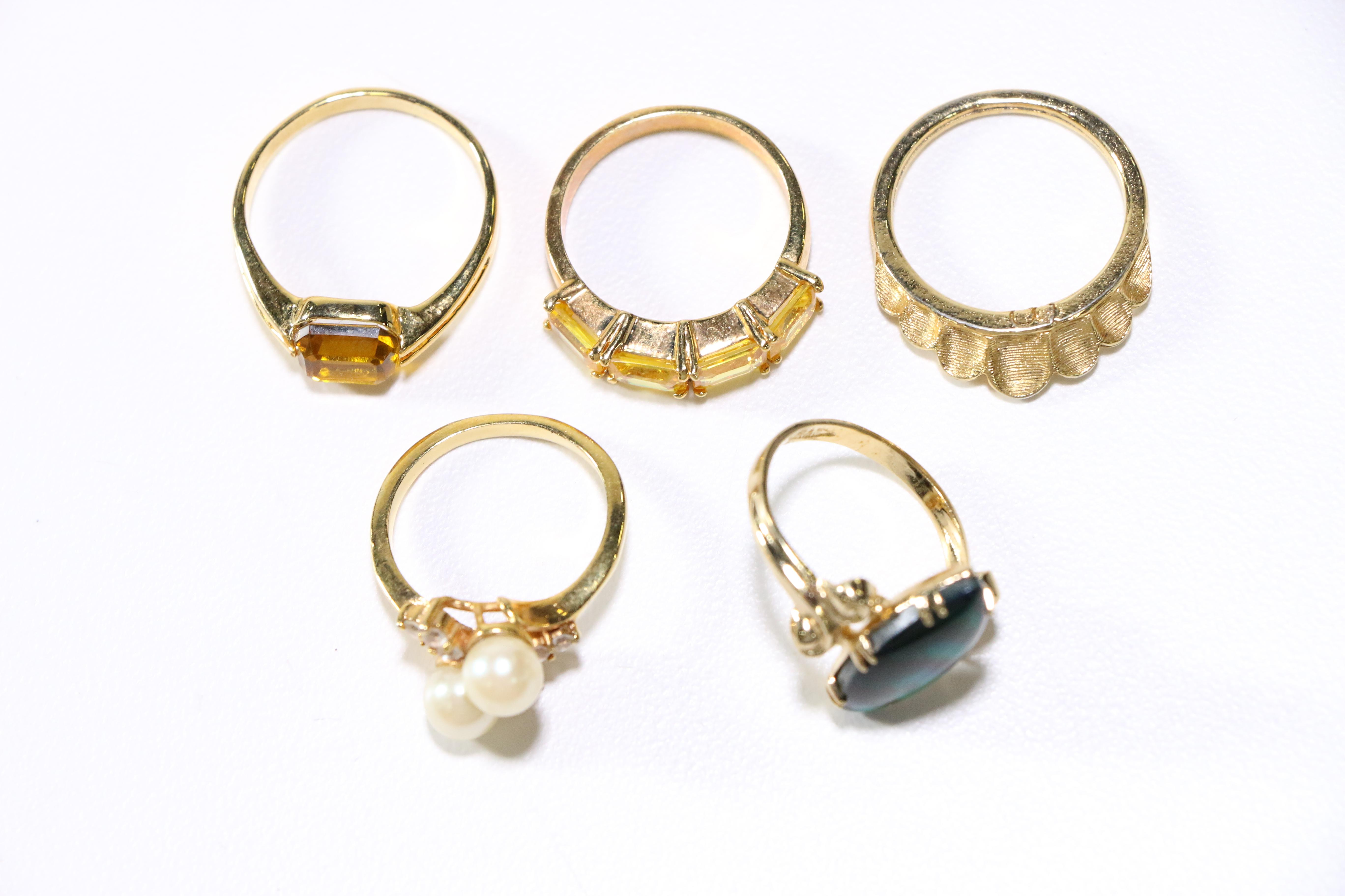 Assorted Gold Tone Rings and Brooches