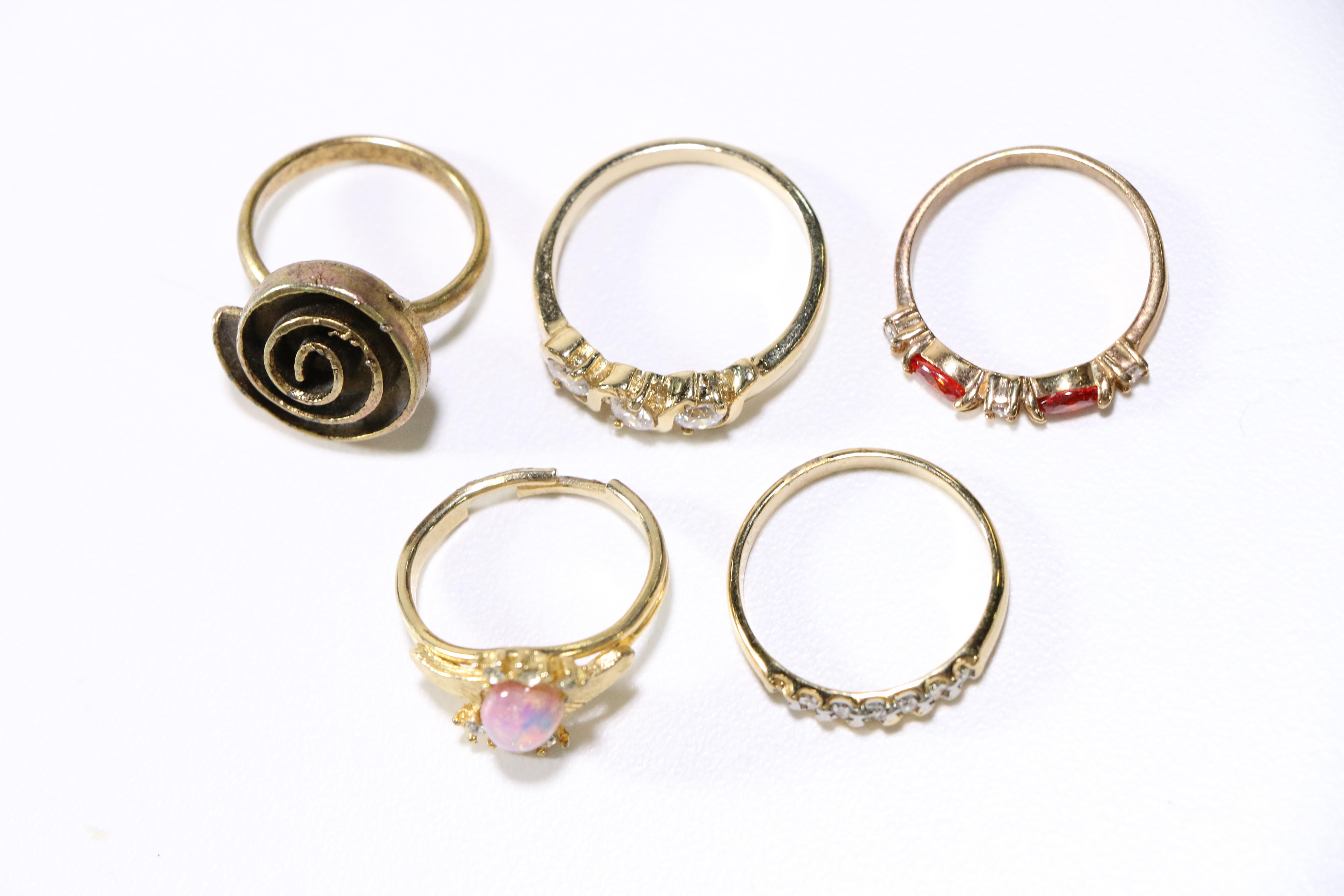Assorted Gold Tone Rings and Brooches