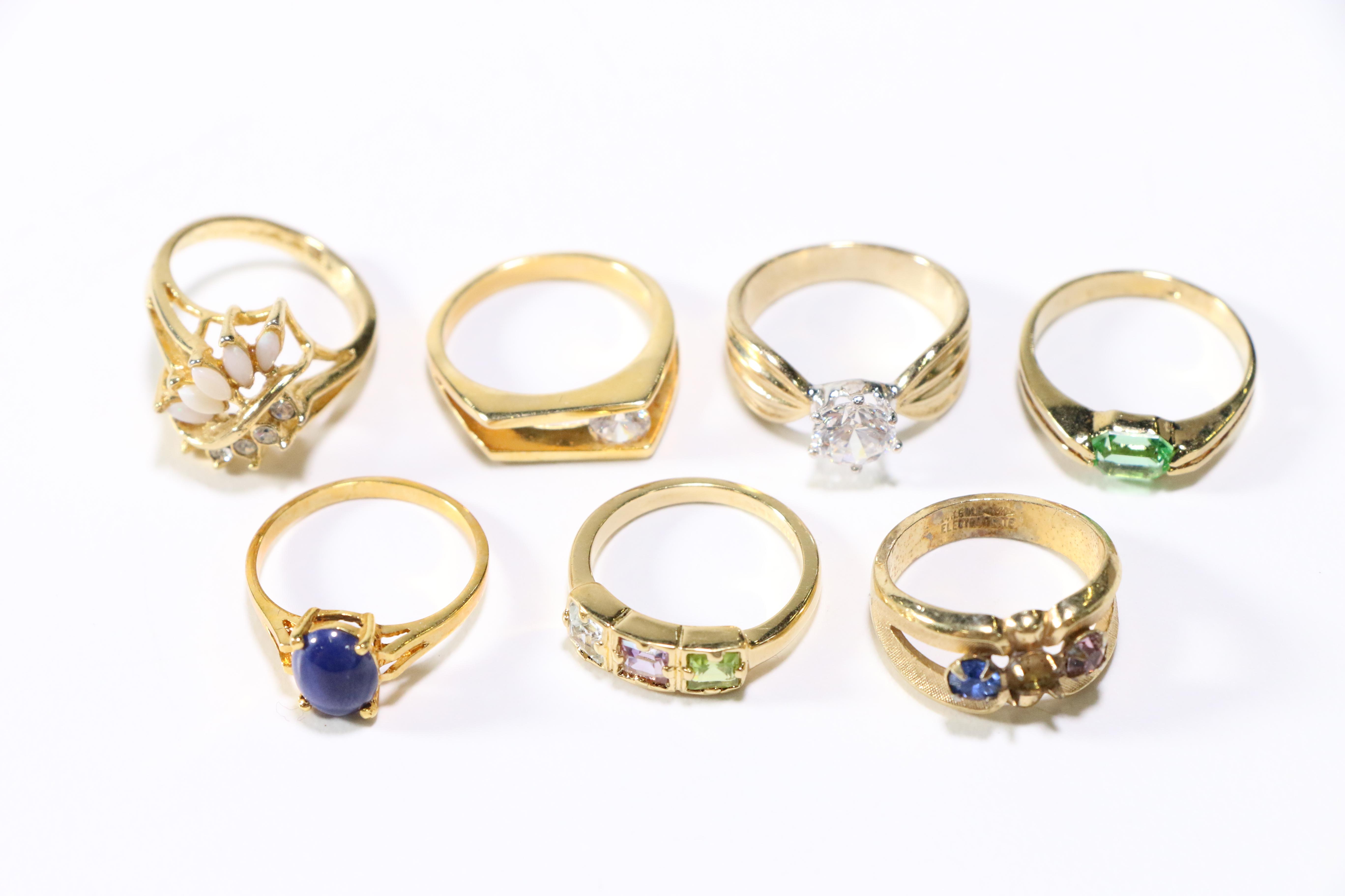 Assorted Gold Tone Rings and Brooches