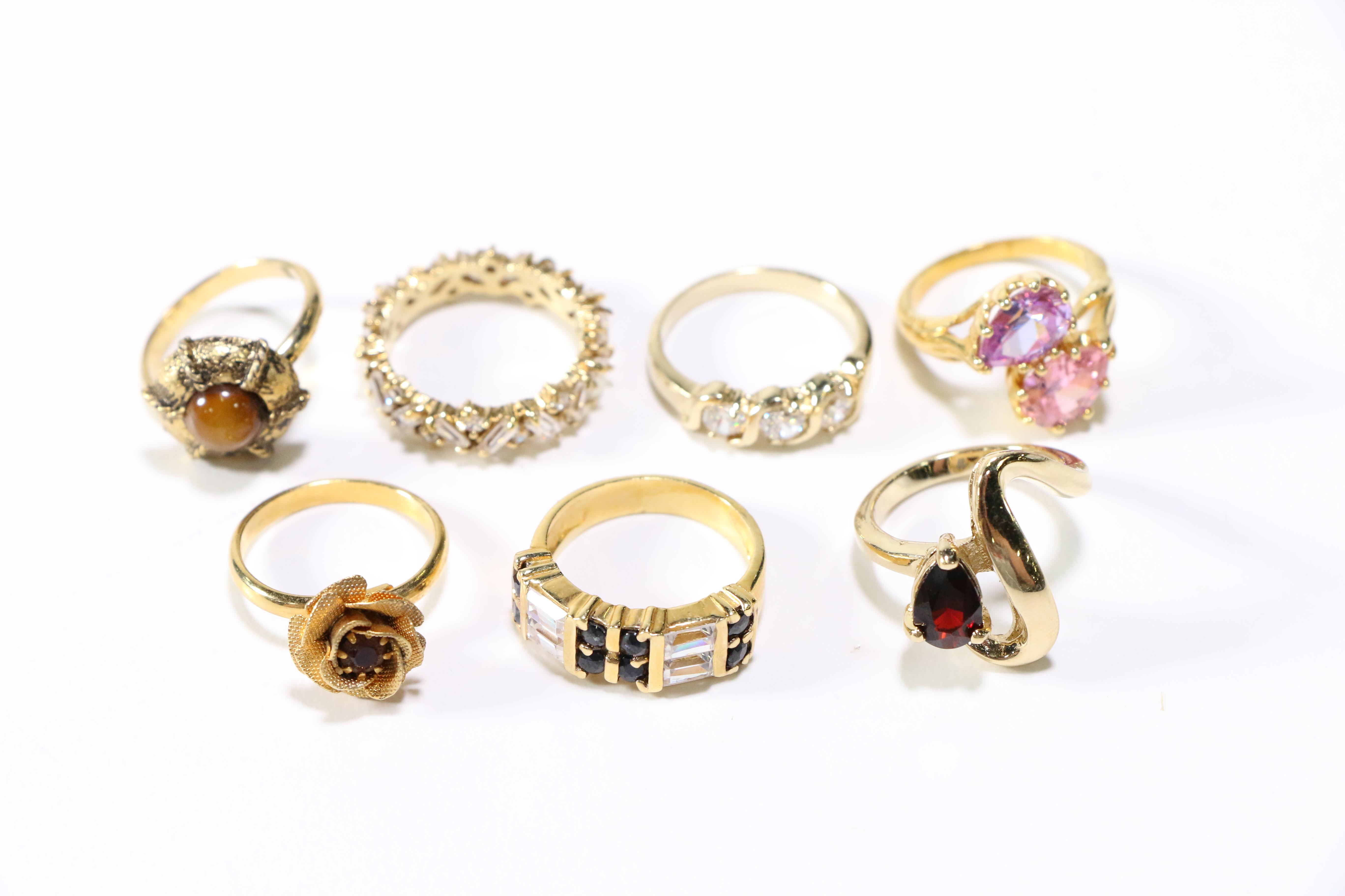 Assorted Gold Tone Rings and Brooches