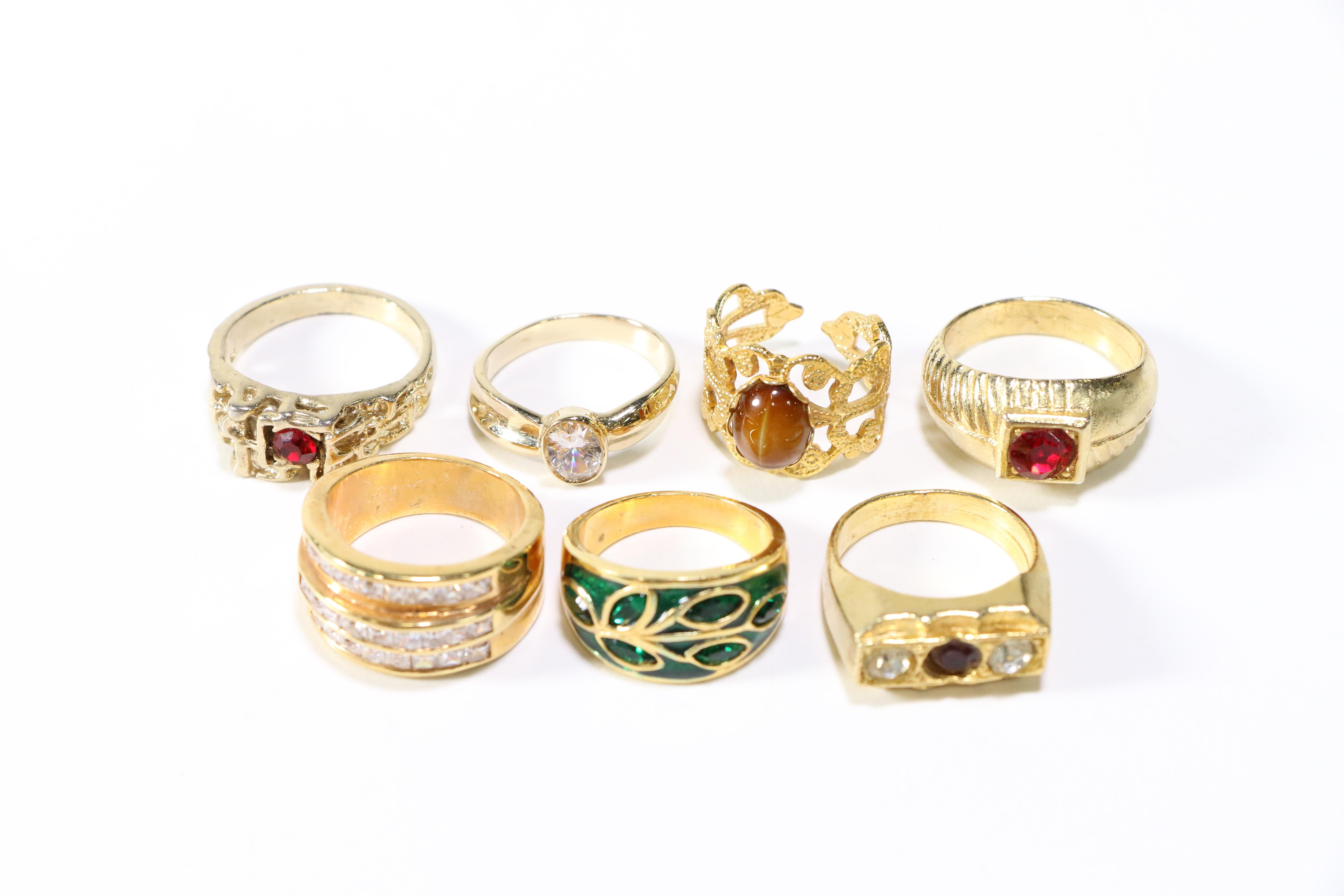 Assorted Gold Tone Rings and Brooches